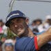 Dustin Johnson hits out of the fescue on the 17th hole during the first round of the U.S. Open golf tournament Thursday, June 15, 2017, at Erin Hills 