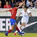 Costa Rica defender Maria Coto (left) defended as United States forward Christen Press dribbled with the ball during the first half of a CONCACAF wome