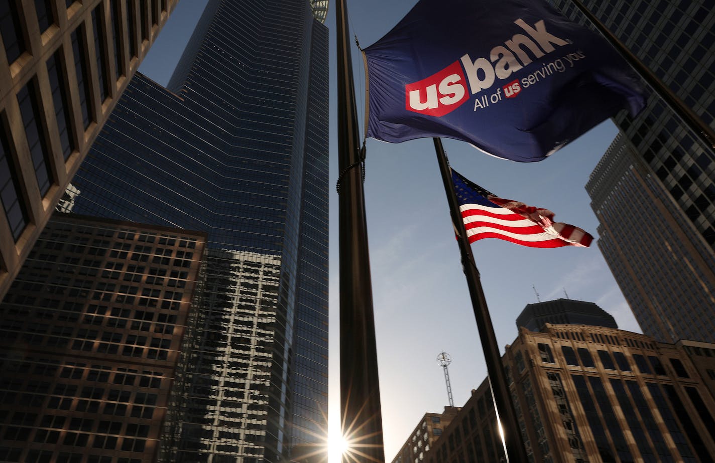 Late afternoon light cut between buildings illuminating the US Bank flag as it blew in the wind outside the US Bank Building Wednesday in downtown Minneapolis. ] ANTHONY SOUFFLE &#xef; anthony.souffle@startribune.com US Bank continues to do better than most comparable banks Wednesday, Oct. 18, 2017 in Minneapolis.