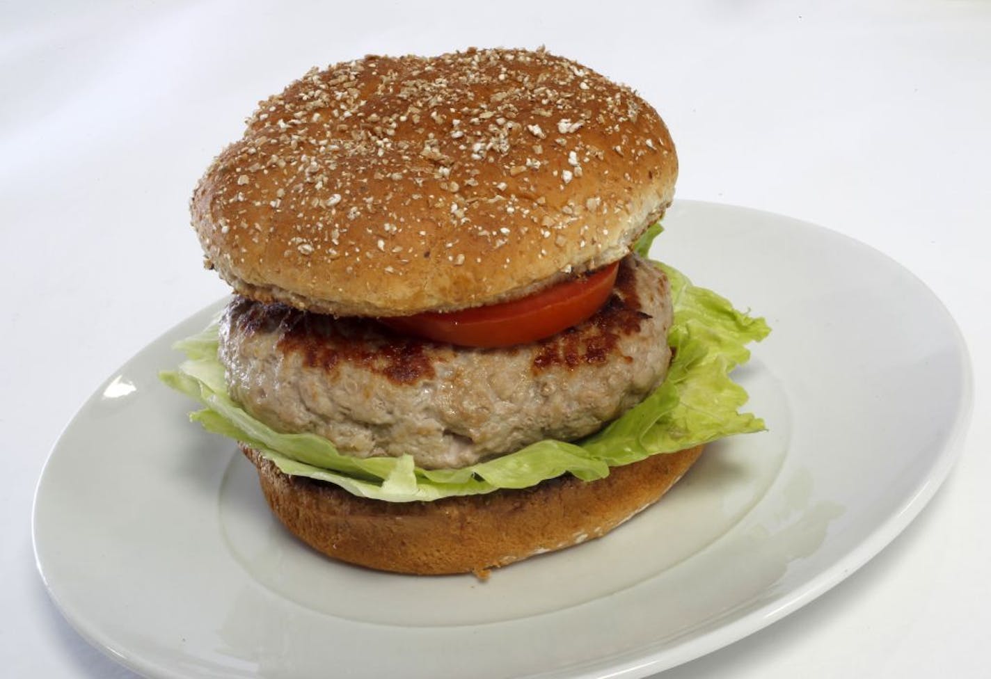 A turkey burger tucks a slice of cheese inside this homemade version of the Juicy Lucy.