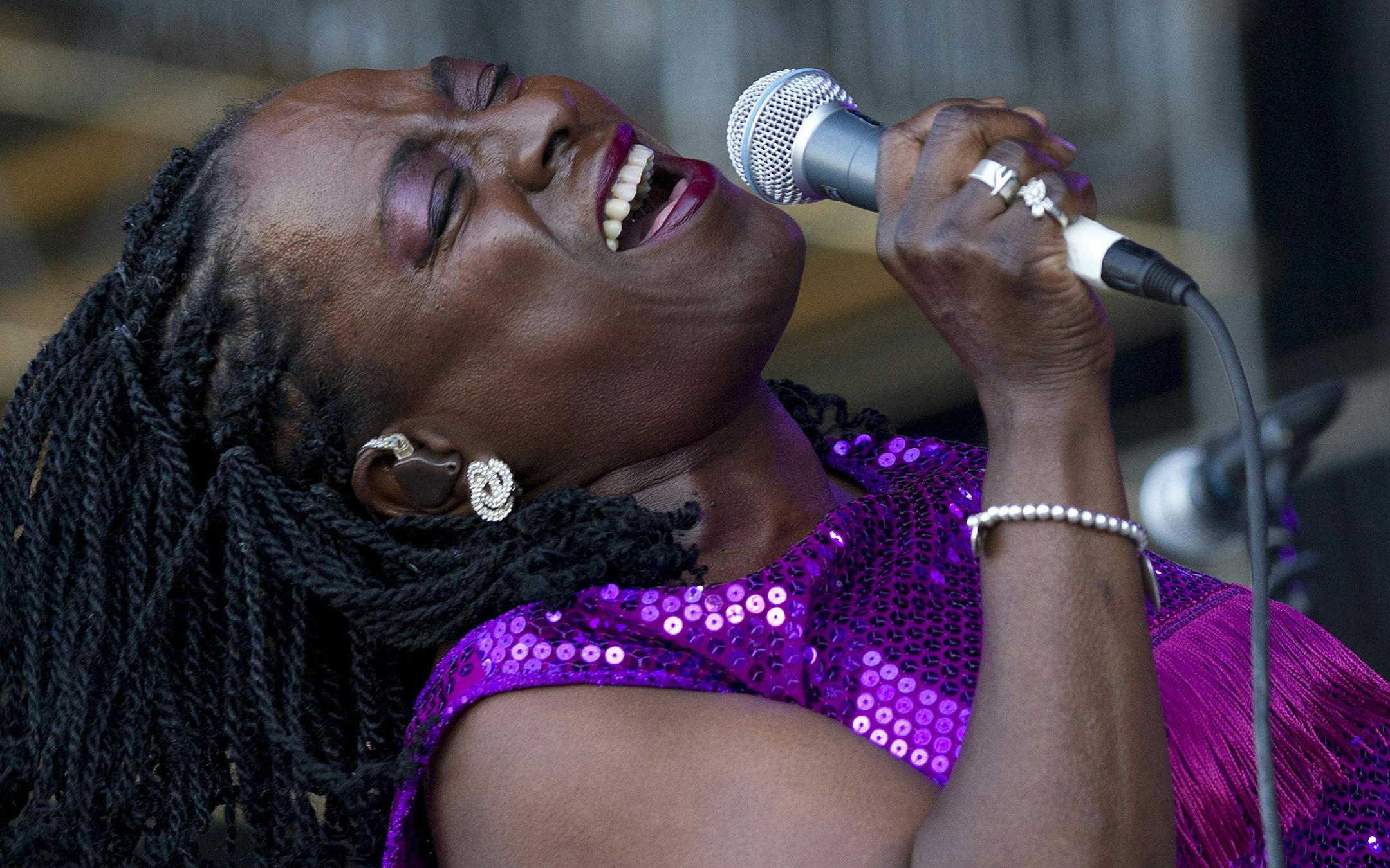 Sharon Jones of Sharon Jones and The Dap-Kings performs during the Bonnaroo Music and Arts Festival in Manchester, Tenn., Friday, June 8, 2012. (AP Photo/Dave Martin) ORG XMIT: TNDM103