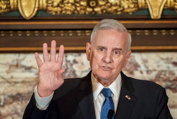 Governor Mark Dayton held a press conference to announce that he made good on a vow to veto the Republican tax and omnibus budget bills Wednesday. ] G