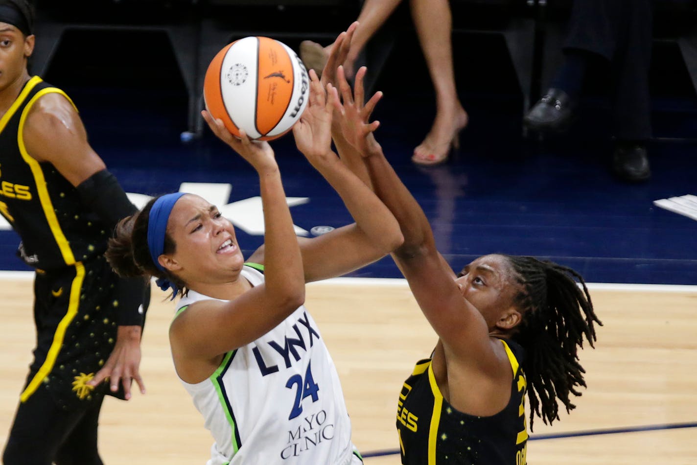 Lynx forward Napheesa Collier shoots over Los Angeles Sparks forward Nneka Ogwumike during the first quarter Thursday