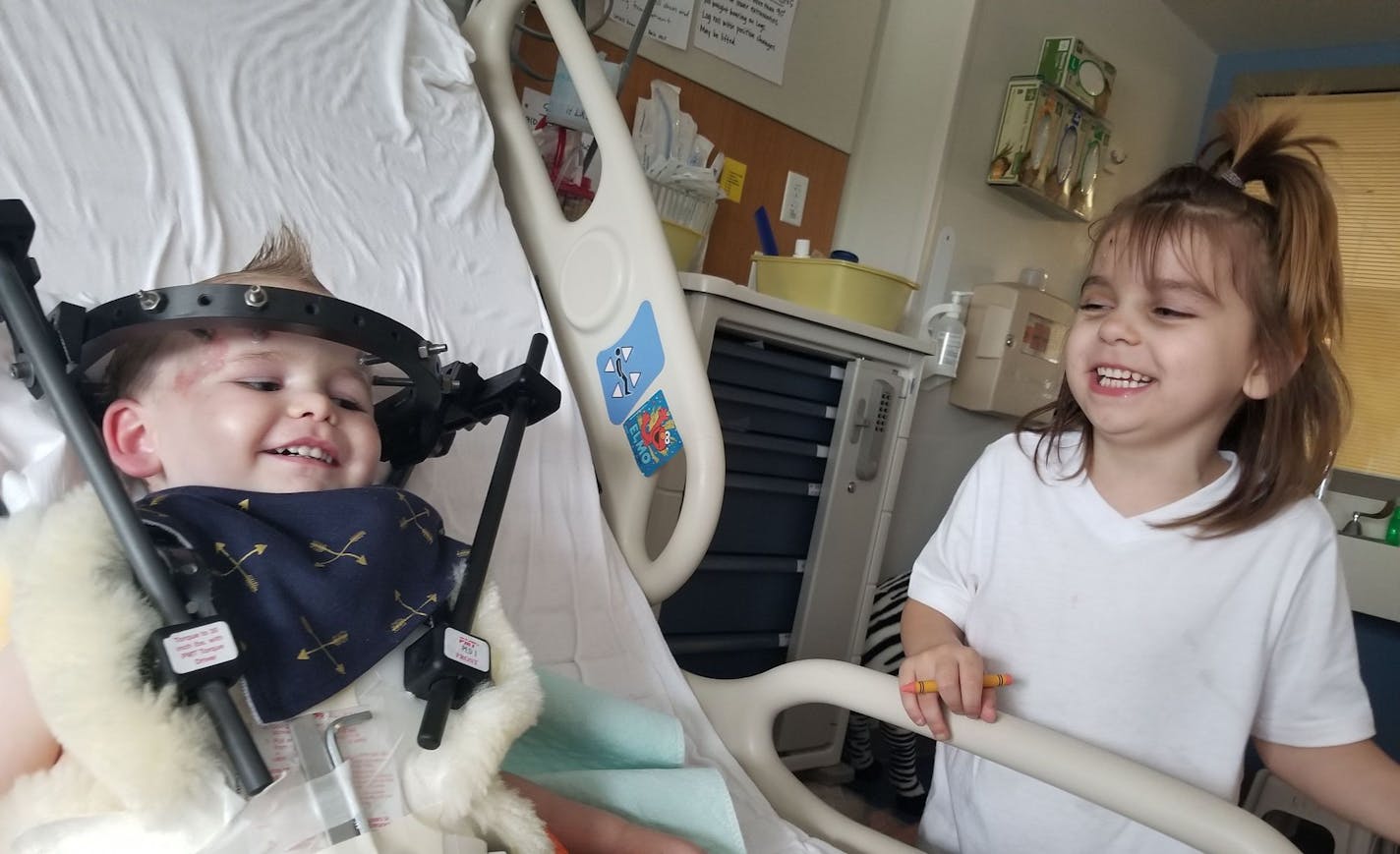 Photo provided by Peltier family Lillianna and Kayden Peltier share a smile. Last month the children were struck by a driver who was fleeing police and careened into the Minneapolis playground where they and their siblings were playing. Three of the Peltiers' seven children were seriously injured.