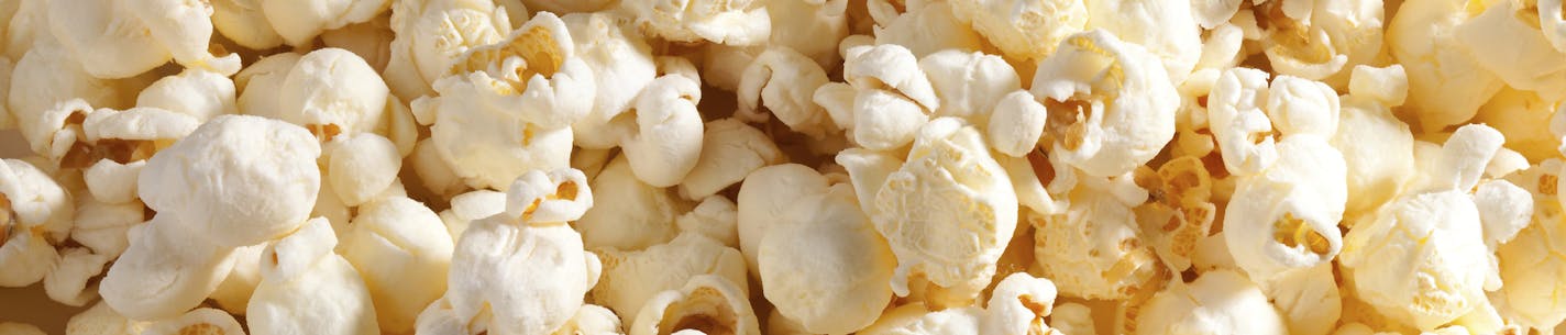 Closeup of popcorn. Some microwave popcorns contain trans fat. iStock