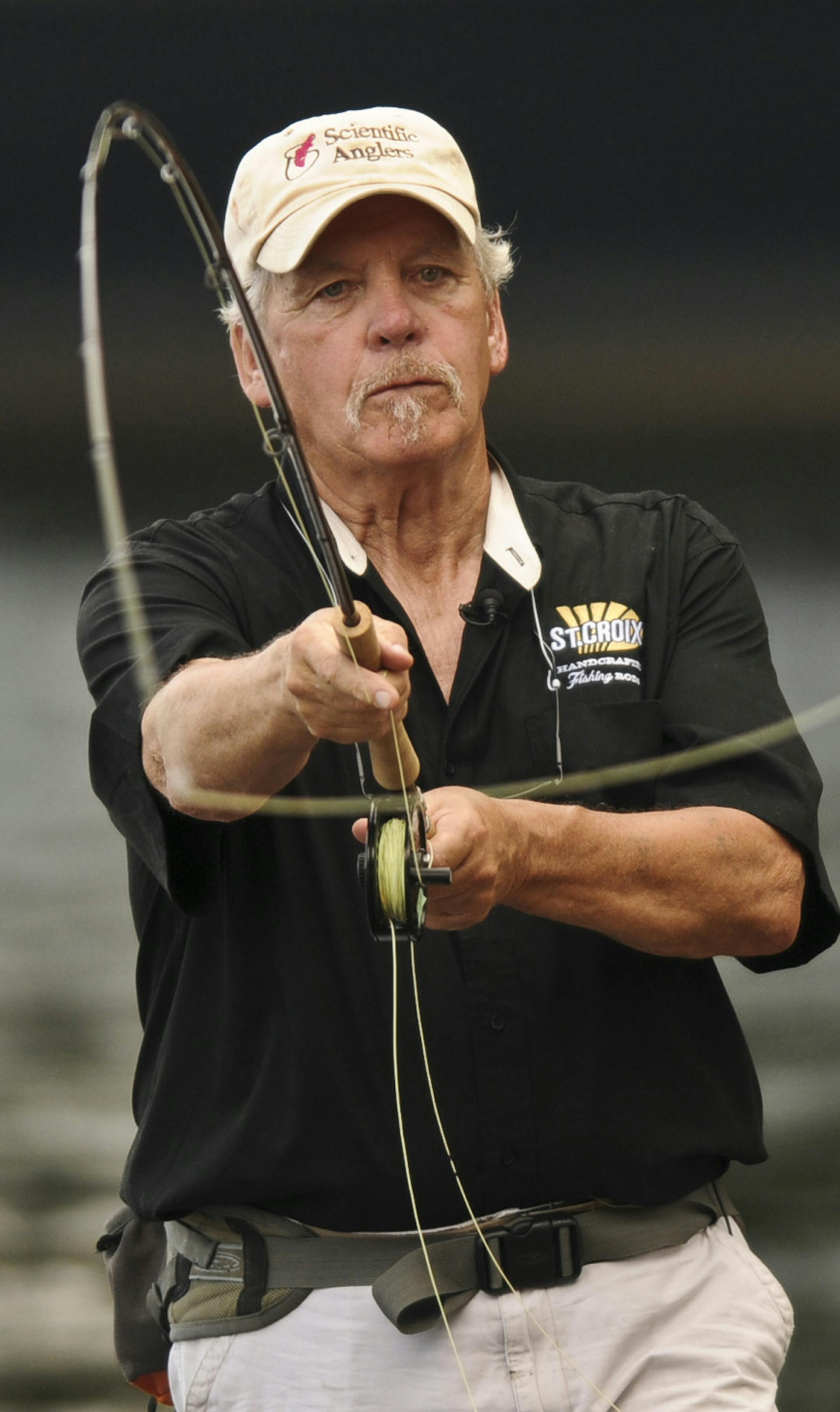 Bob Nasby is a expert at "spey'' casting, the two-handed European style of fly casting, which he practices on the St. Croix River in Bayport, Minnesota, on July 27, 2011. (Richard Sennott/Minneapolis Star Tribune/MCT) ORG XMIT: MIN2014032113433009