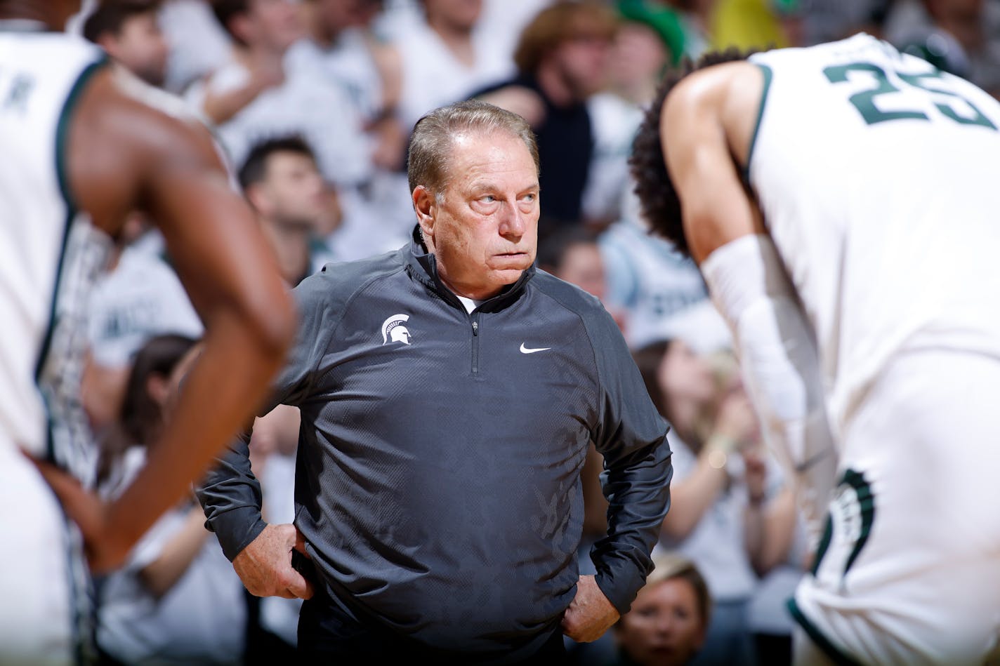 Michigan State coach Tom Izzo, center, Malik Hall, right, and Tyson Walker react during overtime against James Madison during an NCAA college basketball game, Monday, Nov. 6, 2023, in East Lansing, Mich. (AP Photo/Al Goldis)