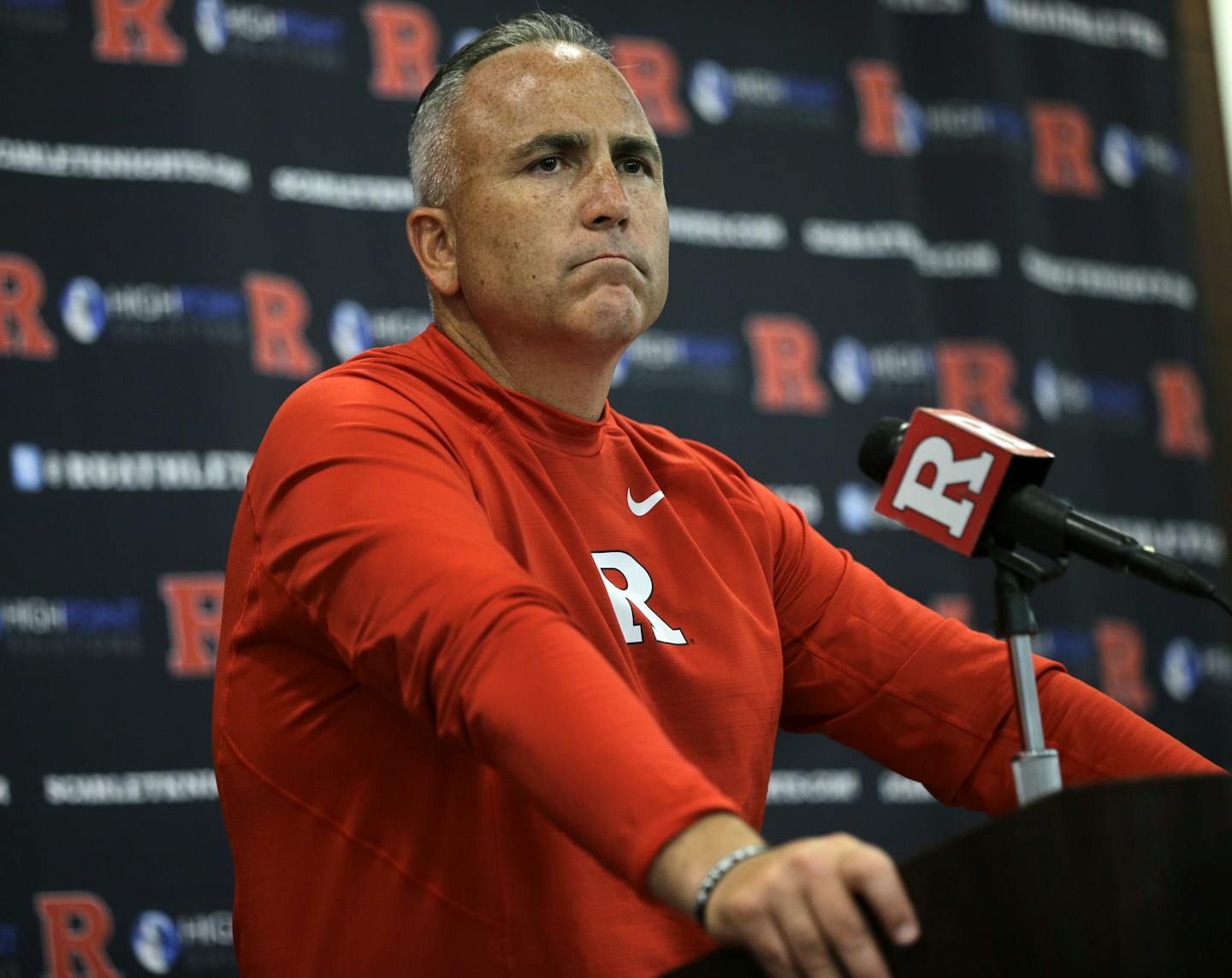 Rutgers head coach Kyle Flood listens to a question as he addresses the media after his team defeated Norfolk State, 63-13 in an NCAA college football game Saturday, Sept. 5, 2015, in Piscataway, N.J. Leonte Carroo caught three third-quarter touchdown passes after sitting out a first-half suspension and set a school record as Rutgers overcame the distractions of an academic investigation involving coach Kyle Flood and the dismissal of five arrested players. (AP Photo/Mel Evans)