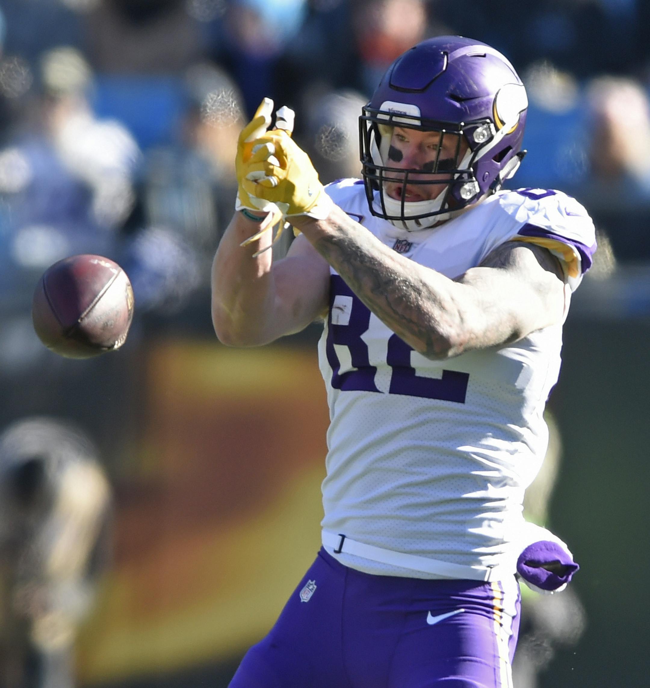 Minnesota Vikings' Kyle Rudolph (82) misses a catch in front of Carolina Panthers' Thomas Davis (58) during the first half of an NFL football game in Charlotte, N.C., Sunday, Dec. 10, 2017. (AP Photo/Mike McCarn)