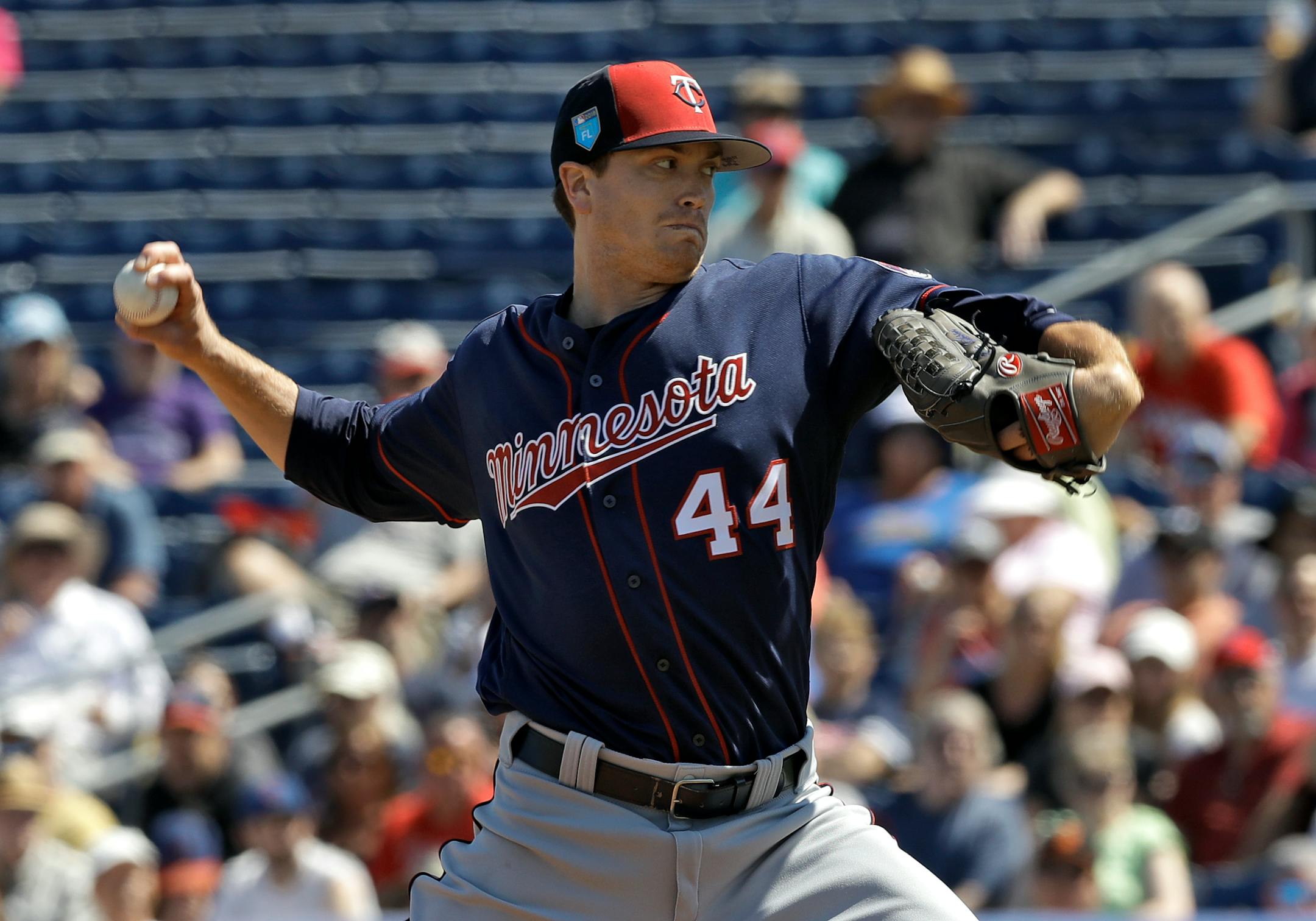 Minnesota Twins starting pitcher Kyle Gibson (44) delivers to the Philadelphia Phillies during the first inning of a spring training baseball game Monday, March 5, 2018, in Clearwater, Fla. (AP Photo/Chris O'Meara)