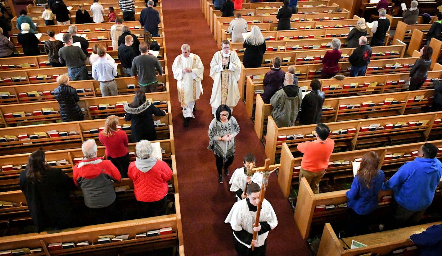 Deacon Gregg Sroder and Parochial Vicar Fr. Andrew Brinkman exit the church at the conclusion of the next to last mass at St. Michael Catholic Church in West St. Paul. ] GLEN STUBBE * gstubbe@startribune.com Sunday, November 20, 2016 The doors are shutting forever at St. Michael Catholic Church in West St. Paul, which will hold its last mass Nov. 27. Church leaders and parishoners heard about the closing just last month during a celebration of the church's sesquicentennial anniversary. Money-sav