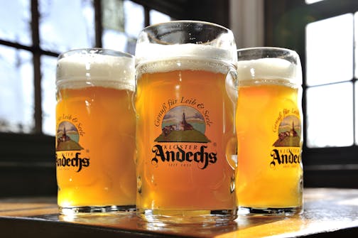 Glasses of German hefeweizen beer from Kloster Andechs brewery from Belgium.