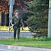 A heavily armed man that police have identified as Justin Bourque walks on Hildegard Drive in Moncton, New Brunswick, on Wednesday, June 4, 2014, afte