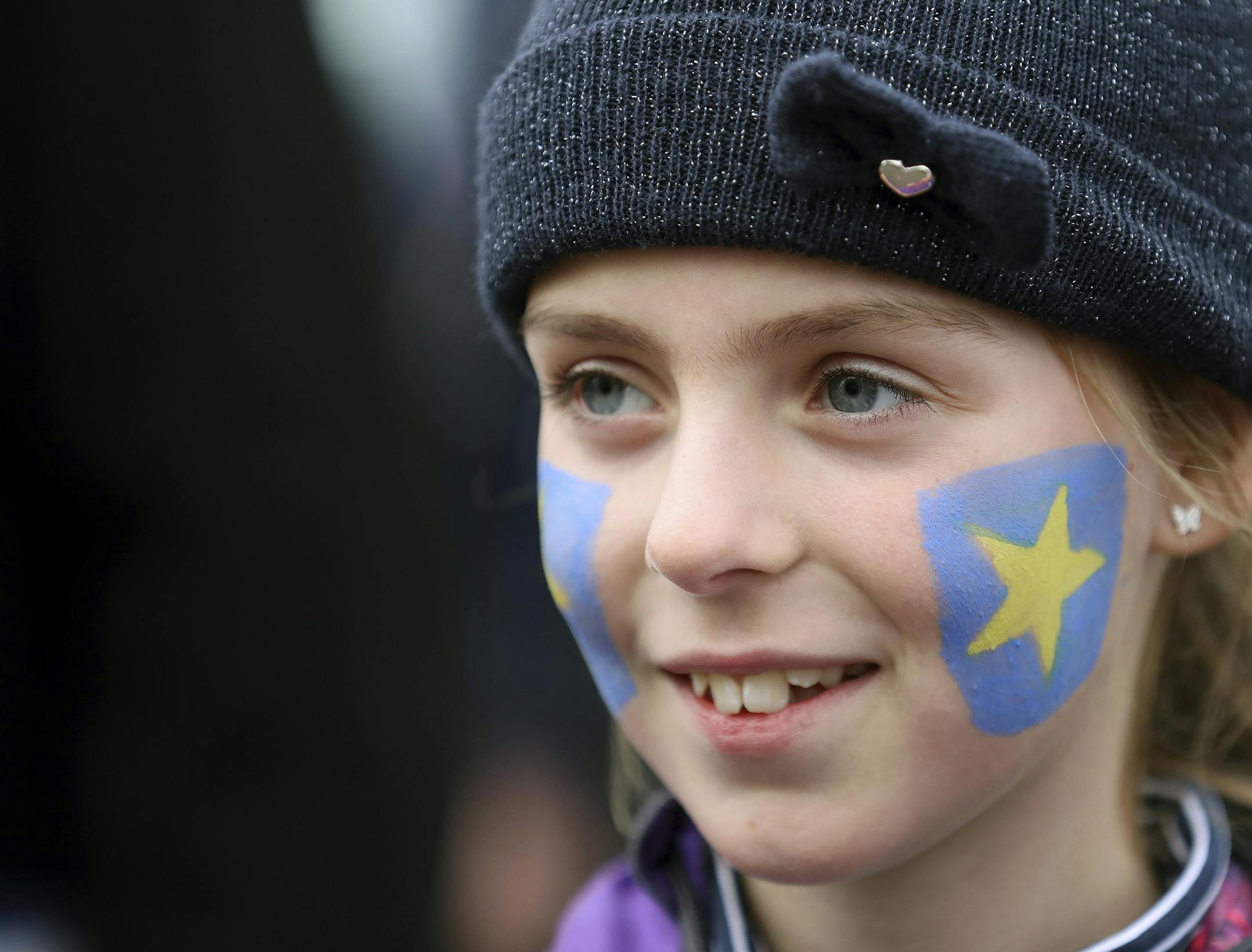 Aoife McGenity joins the border Brexit protest on the Irish border, on the Old Dublin Road, in Carrickcarnon, Ireland, Saturday, March 30, 2019. Border communities protested against Brexit by holding various rallies around Ireland. (AP Photo/Peter Morrison