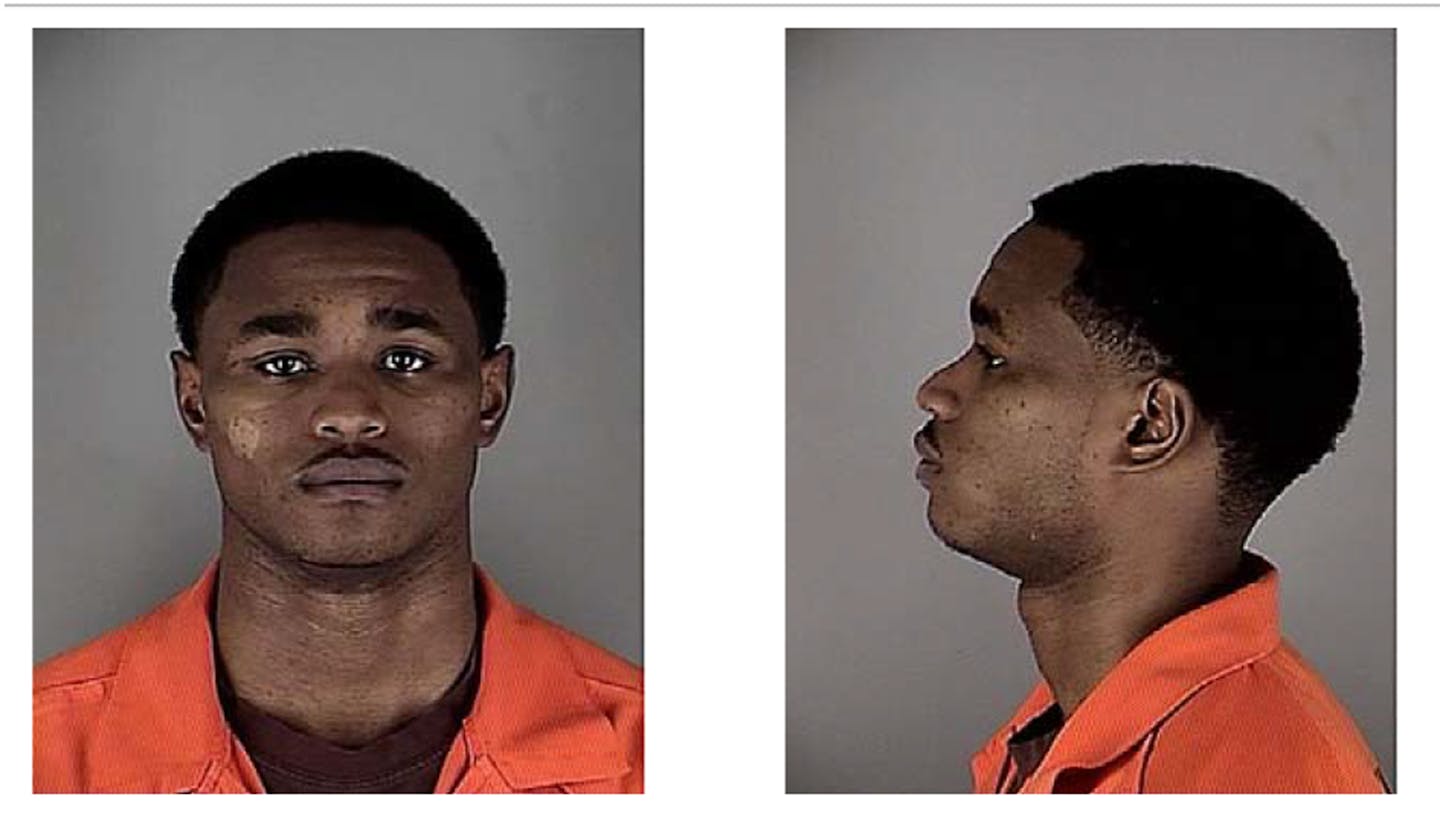 Booking mug 11/24/14 for Daquein McNeil, Gophers basketball sophomore guard.