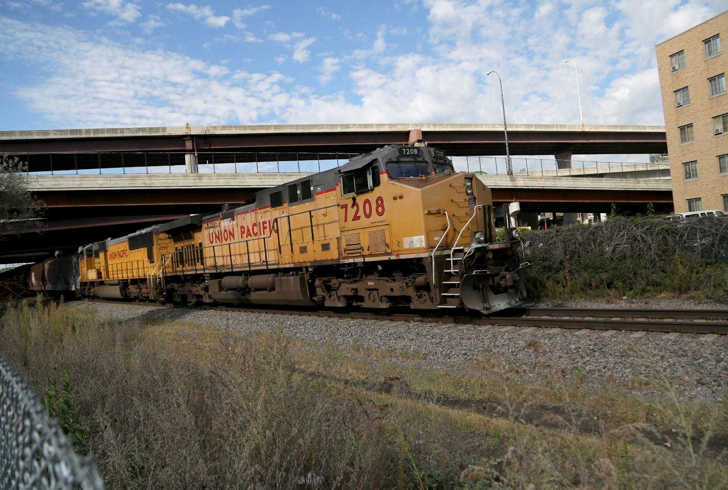 Southwest LRT officials will lead a tour of the area where a 10-foot wall is proposed. Here, the rear of a freight train traveling west near the Catholic Charities building is visible during a Southwest LRT tour Thursday, Sept. 28, 2017, in Minneapolis, MN.] DAVID JOLES &#xef; david.joles@startribune.com Controversy continues to stir over a proposed 10-foot concrete wall that will separate freight and light trains along the Southwest LRT route in Minneapolis. In an effort to appease its critics,