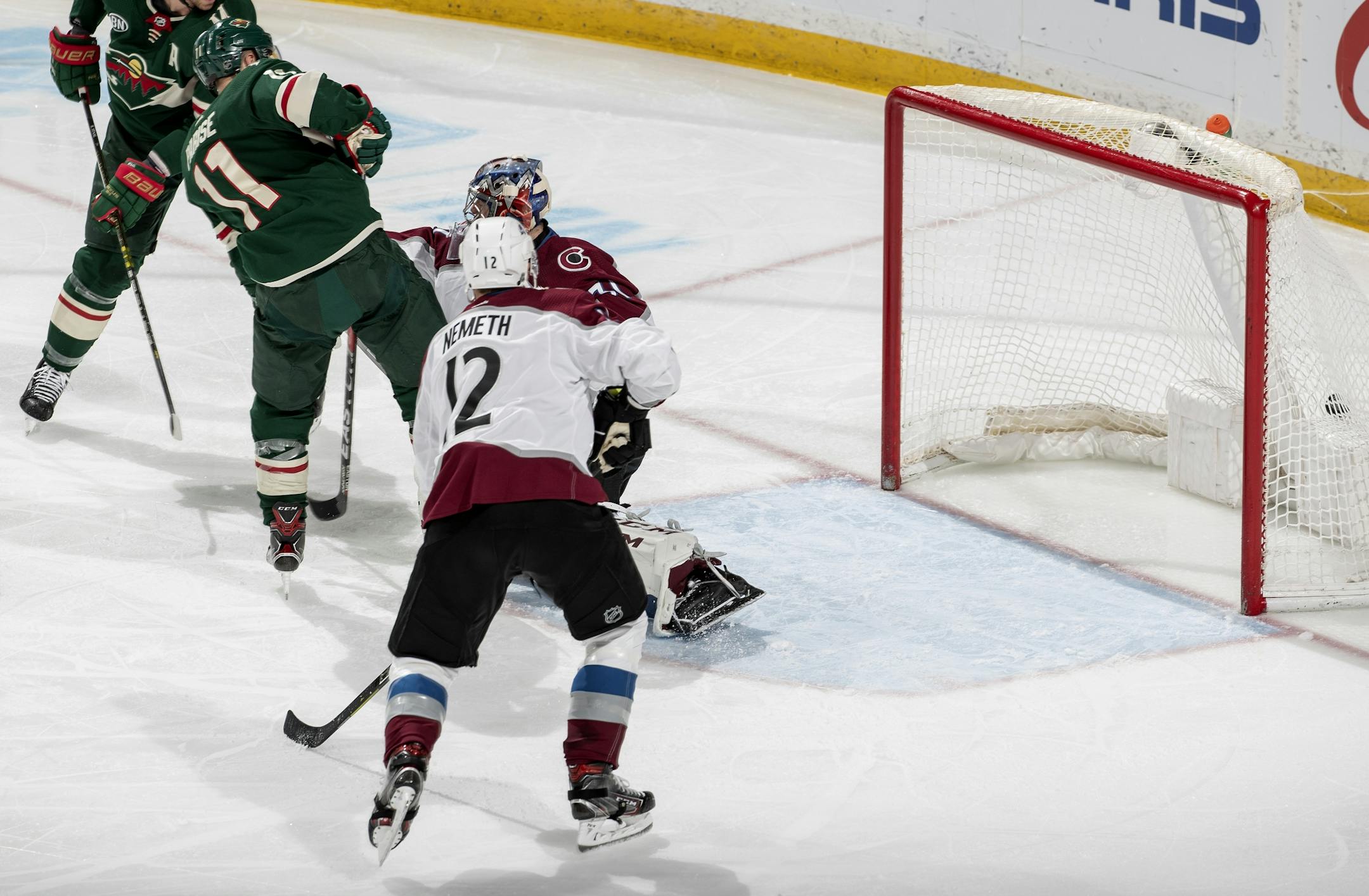 Zach Parise (11) redirected the puck past Avalanche goalie Philipp Grubauer (31) for a goal in the second period.