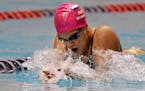 Reigning world 100-meter breaststroke champion Yulia Efimova is among four Russian swimmers withdrawn by the Russian swimming federation because they 