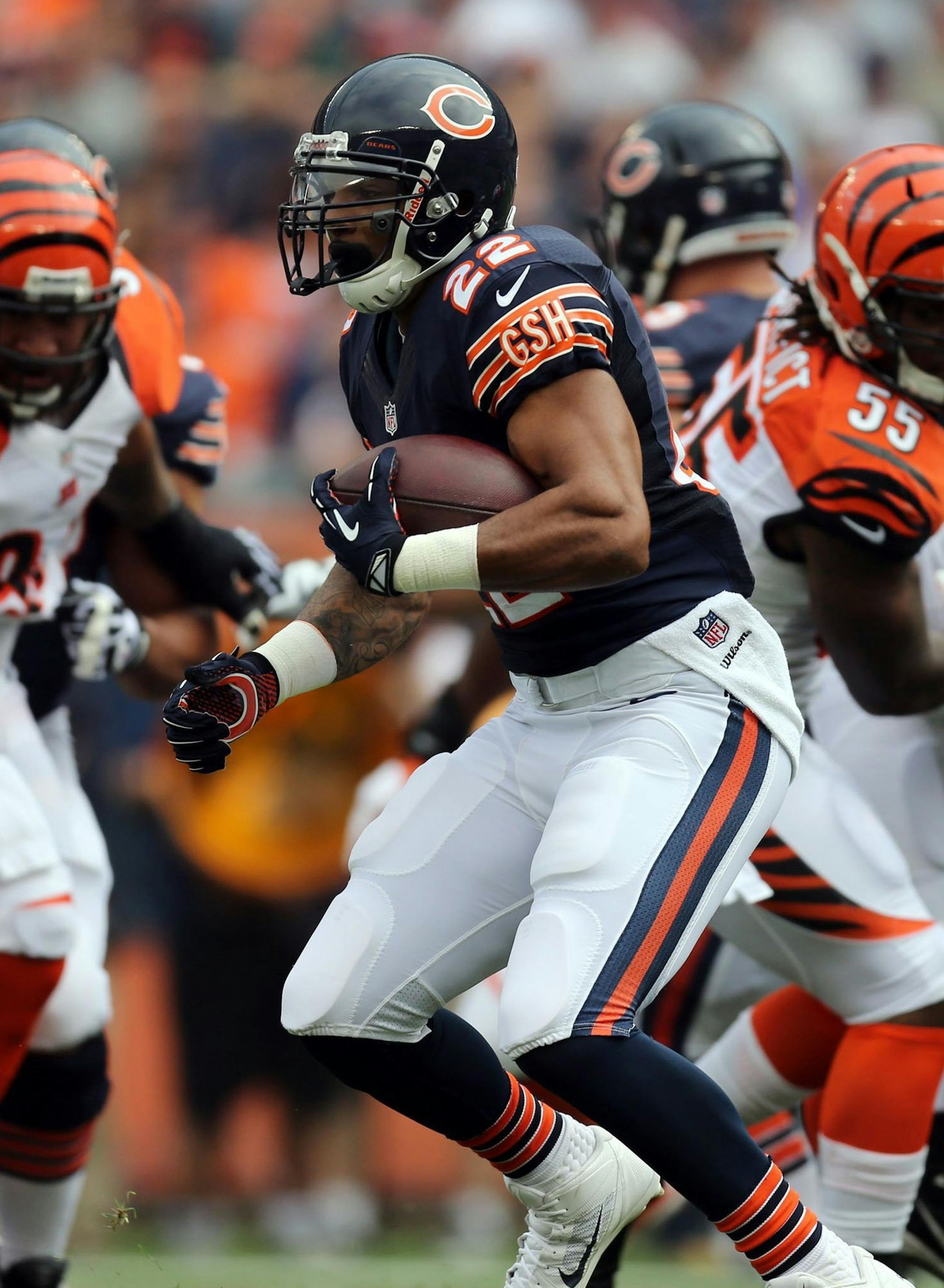 Chicago Bears running back Matt Forte (22) runs the ball against the Cincinnati Bengals in the first quarter at Soldier Field in Chicago, Illinois, on Sunday, September 8, 2013. (Brian Cassella/Chicago Tribune/MCT)