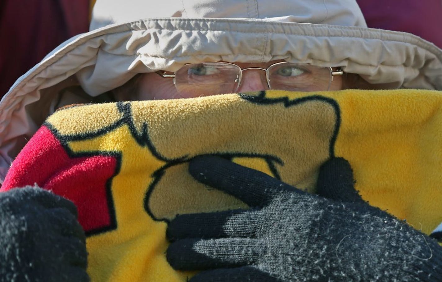 Vicky Nelson of Clearwater bundled up as she made her way to the Gophers women's basketball game at Williams Arena on 1/4/14.