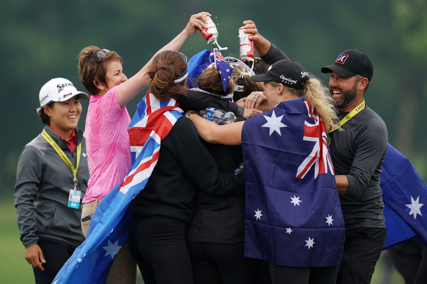 Hannah Green was mobbed on the eighteenth hole green Sunday after winning the KPMG Women's PGA Championship Tournament Sunday.