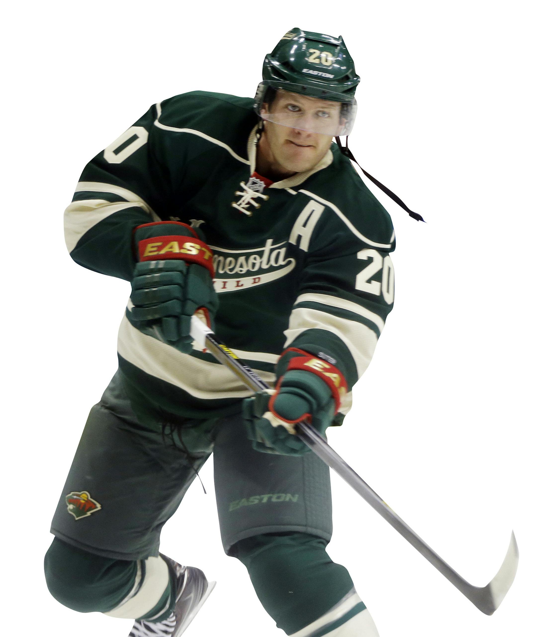 Minnesota Wild's Ryan Suter warms up prior to the first period of an NHL hockey game against the Los Angeles Kings, Thursday, Oct. 3, 2013, in St. Paul, Minn. (AP Photo/Jim Mone) ORG XMIT: MNJM10 ORG XMIT: MIN1401280141033375