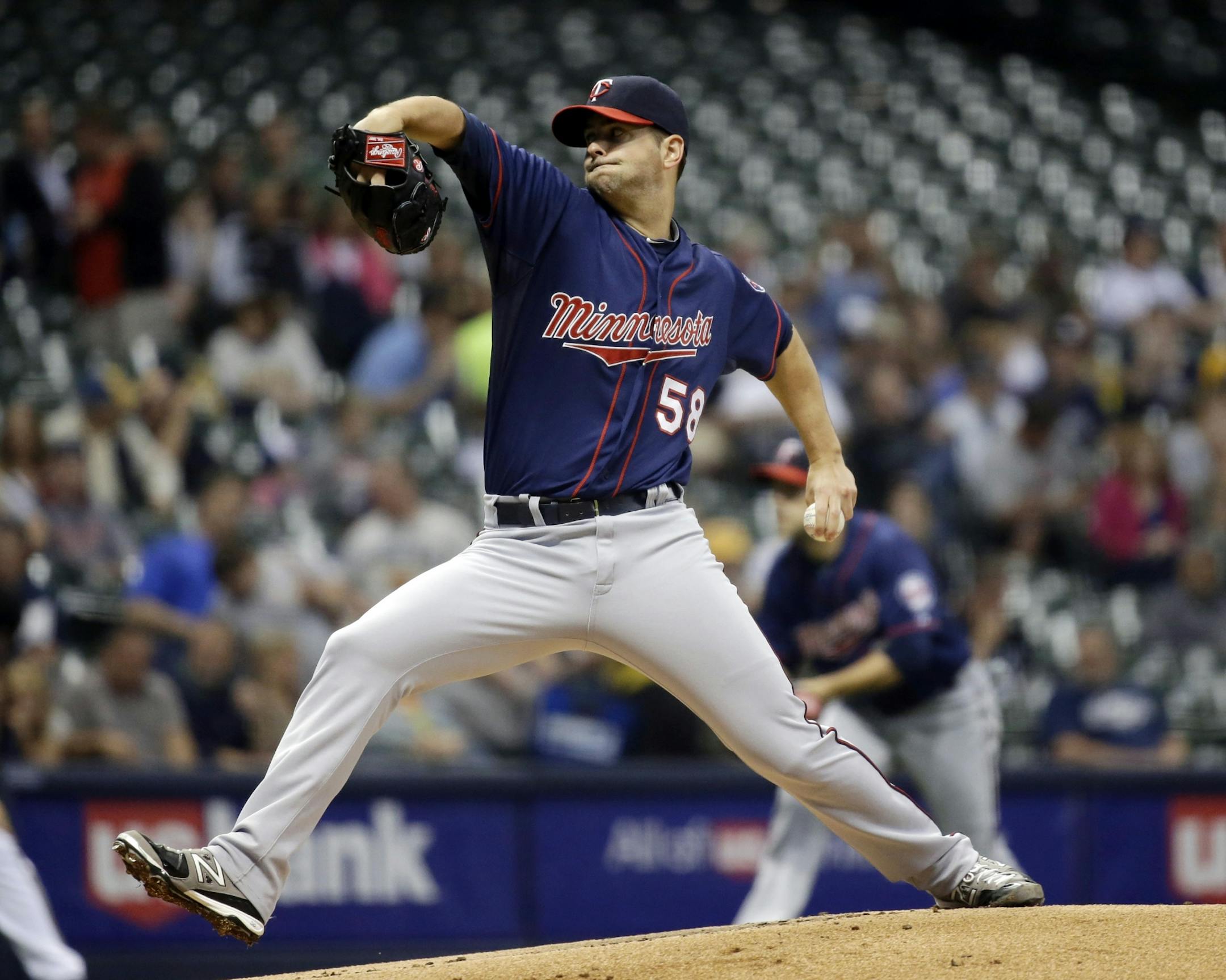 Minnesota Twins starting pitcher Scott Diamond throws during the first inning of a baseball game against the Milwaukee Brewers Tuesday, May 28, 2013, in Milwaukee.