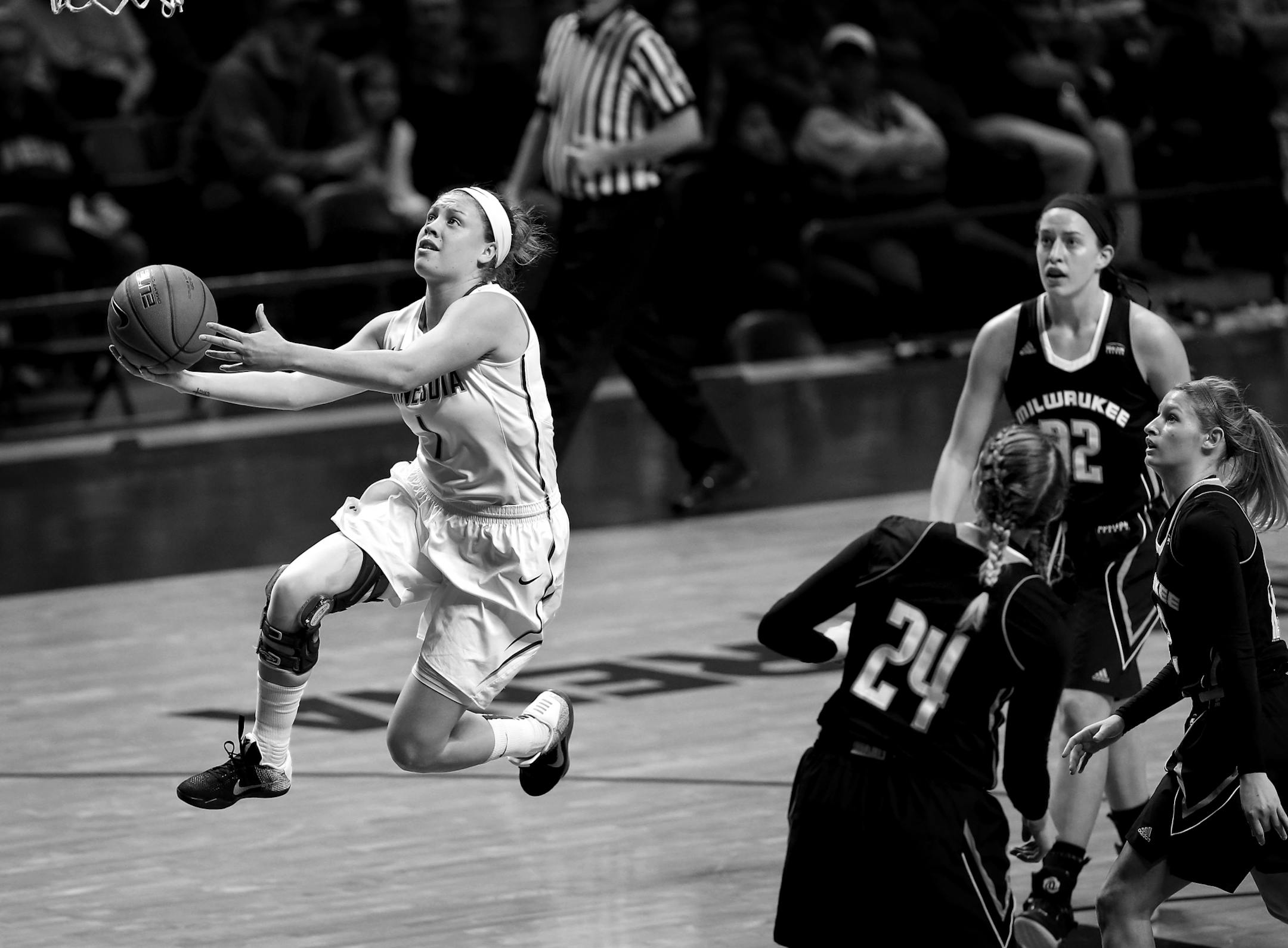 Rachel Banham attempted a shot in the second quarter during a WNIT game vs. Milwaukee.