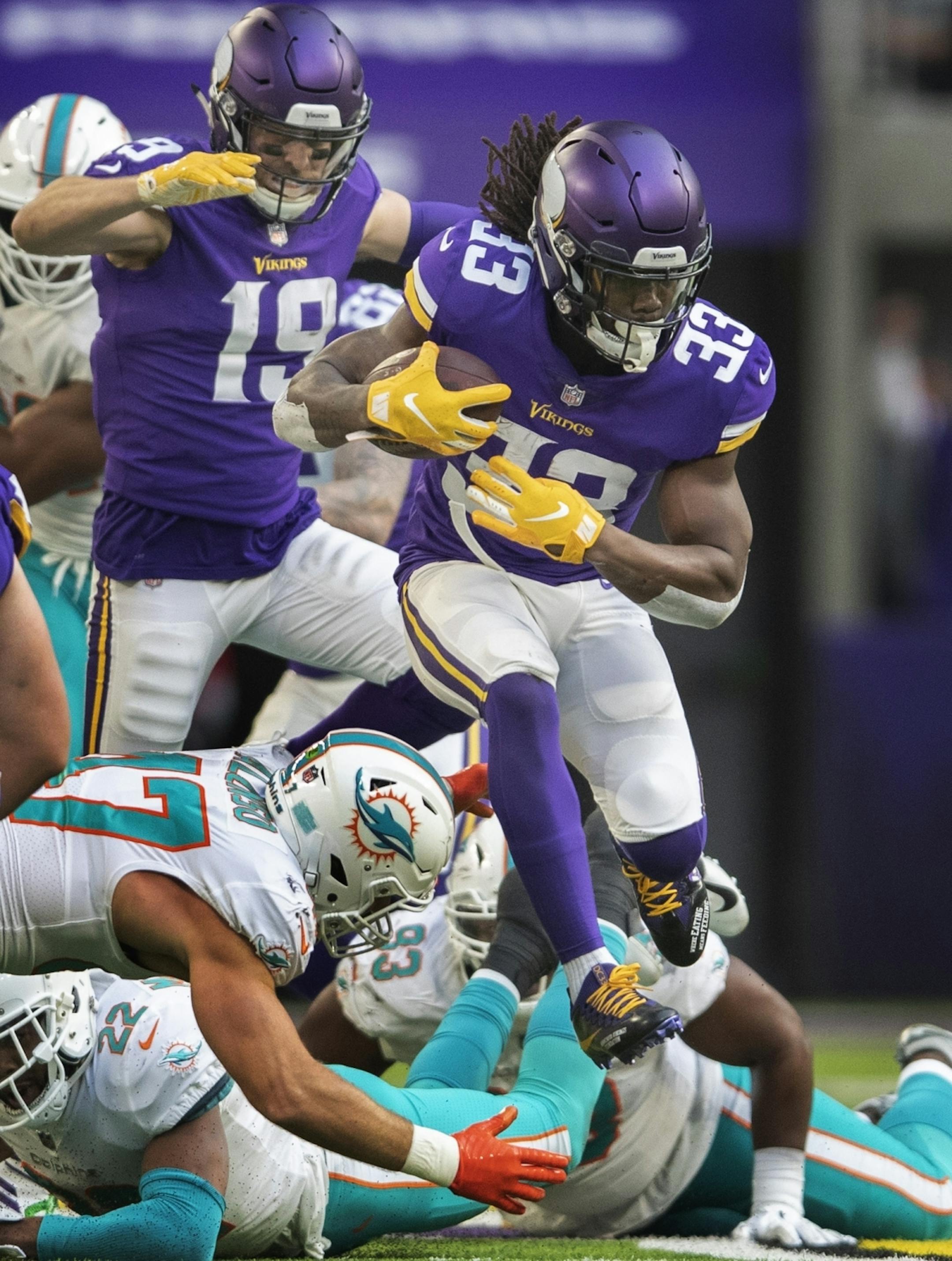 Minnesota Vikings running back Dalvin Cook (33) picked up a first down in the first quarter at U.S. Bank Stadium Sunday December 16, 2018 in Minneapolis, MN.