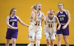 Waconia forward Addy Salzer (31) celebrated with guard Tess Johnson (11) as Red Wing guard Sydnee Nelson (2) and forward Abi Deming (25) were dejected