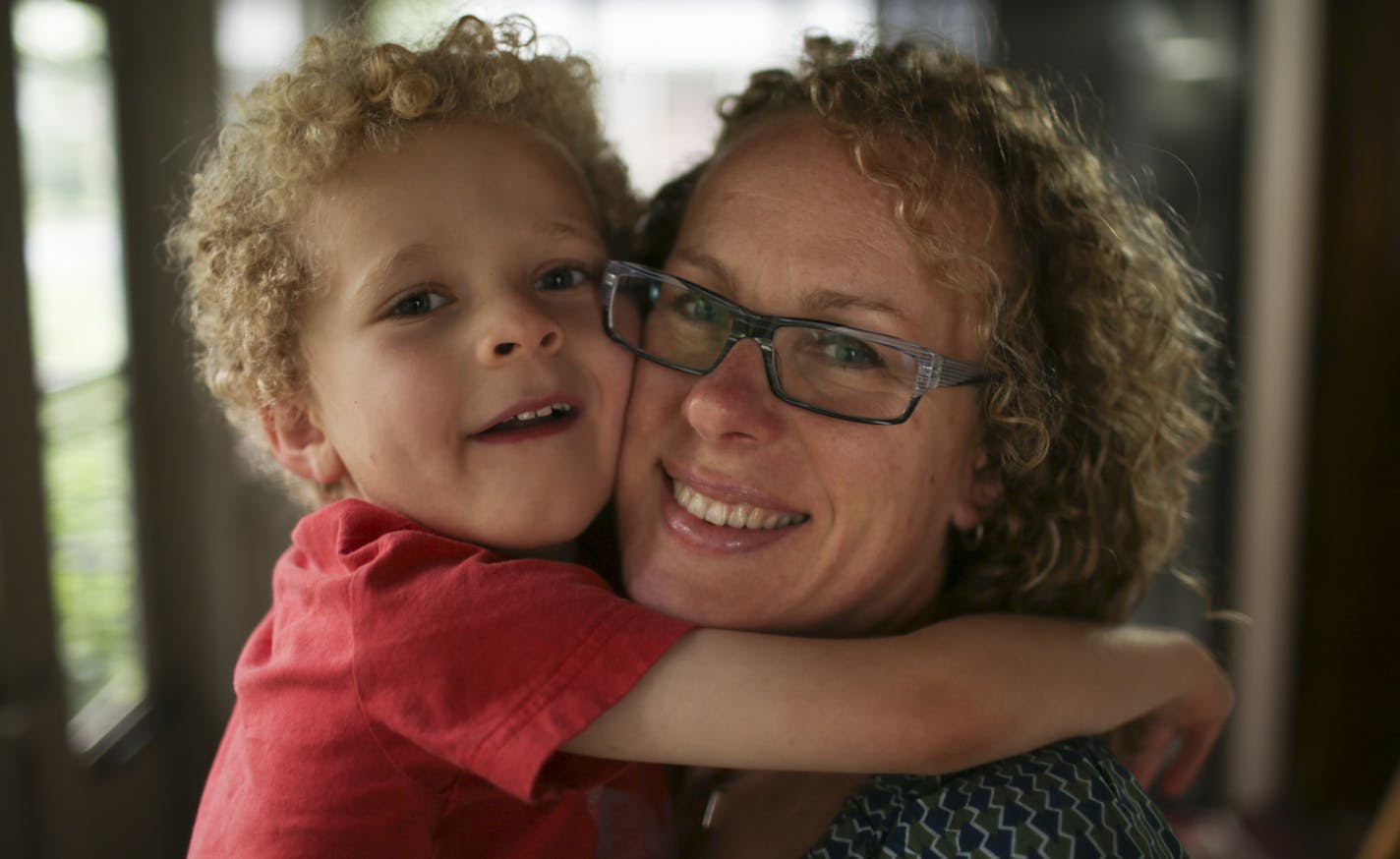 Heidi Klukas and her son, William, 5, at their home Thursday afternoon in Minneapolis. ] JEFF WHEELER &#xef; jeff.wheeler@startribune.com Heidi Klukas is planning to buy a house in a different neighborhood from where she lives now so that her son, William, 5, can begin school in the fall where there is a program to accommodate his mild autism. They were photographed together on the front porch of their Minneapolis home Thursday afternoon, June 11, 2015.