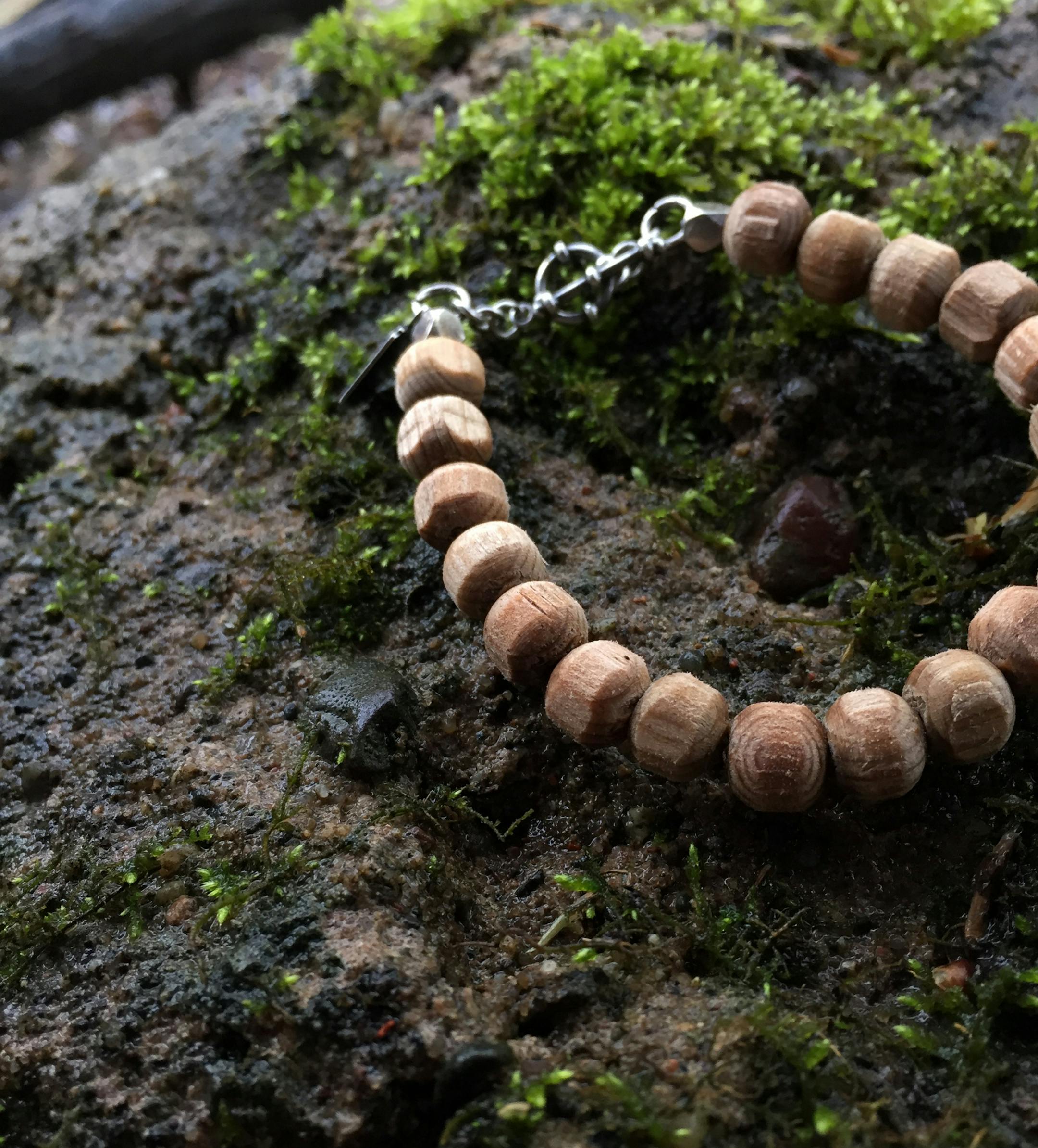 Rugged wood makes for a manly adornment by Urbain.