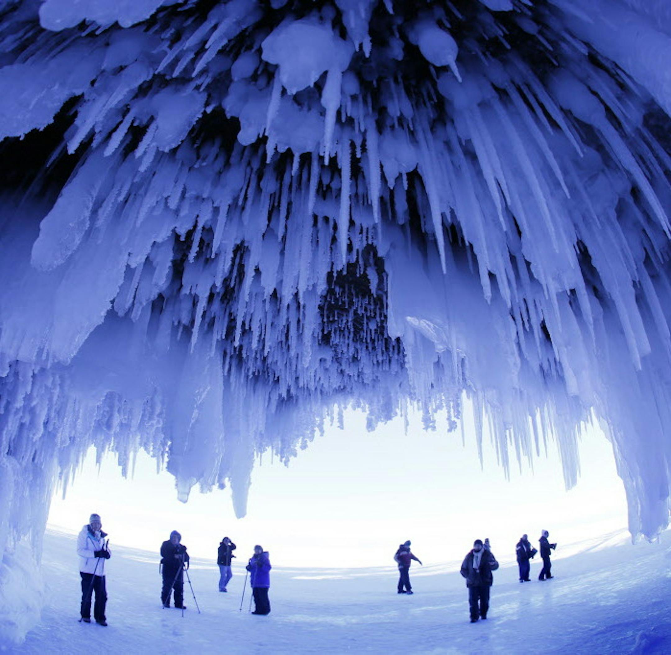 It's been 5 years since the ice has frozen along the south shore of Lake Superior, creating access to the wonders of the Ice Caves of the Apostle Islands National Lakeshore. Over the weekend over 8,000 people made the pilgrimage, a mile walk along the frozen shore, to witness and photograph the crystal wonders of the caves. ] BRIAN PETERSON ï brianp@startribune.com Cornucopia, WI 02/02/2014 ORG XMIT: MIN1402030840440616 ORG XMIT: MIN1410151727070605 ORG XMIT: MIN1502251744464219