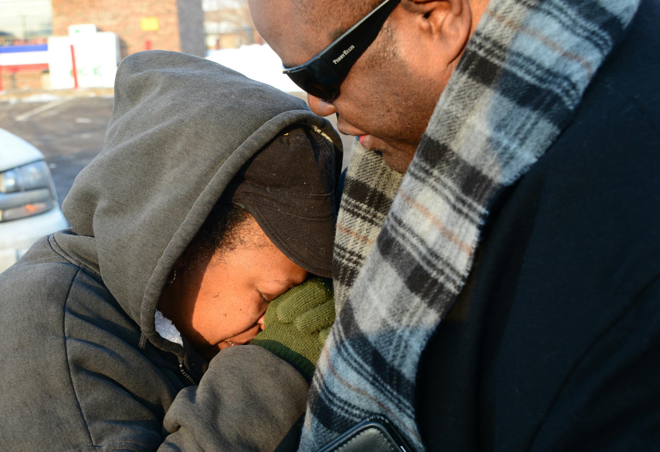 Shooting scene where Two people were fatally shot and another was wounded early Friday at an after-hours establishment at 39th St. and Fremont Av. N. in Minneapolis, according to Minneapolis police. Friends and family members on the scene of the shooting. Monique White was comforted by Pastor Harding Smith near the shooting scene .She hadjust learned that her step son was fatally shot at the after hours club ] Richard.Sennott@startribune.com Richard Sennott/Star Tribune. , Minneapolis Minn.Frida