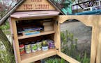 A Seattle Little Free Library is packed with useful things.