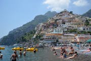 Nothing like a mid-afternoon swim on the beach of Positano, a too-pretty-to-believe seaside town on the Amalfi Coast.