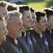 Europe captain Darren Clarke poses for a picture with his team before a practice round for the Ryder Cup golf tournament Tuesday, Sept. 27, 2016, at H