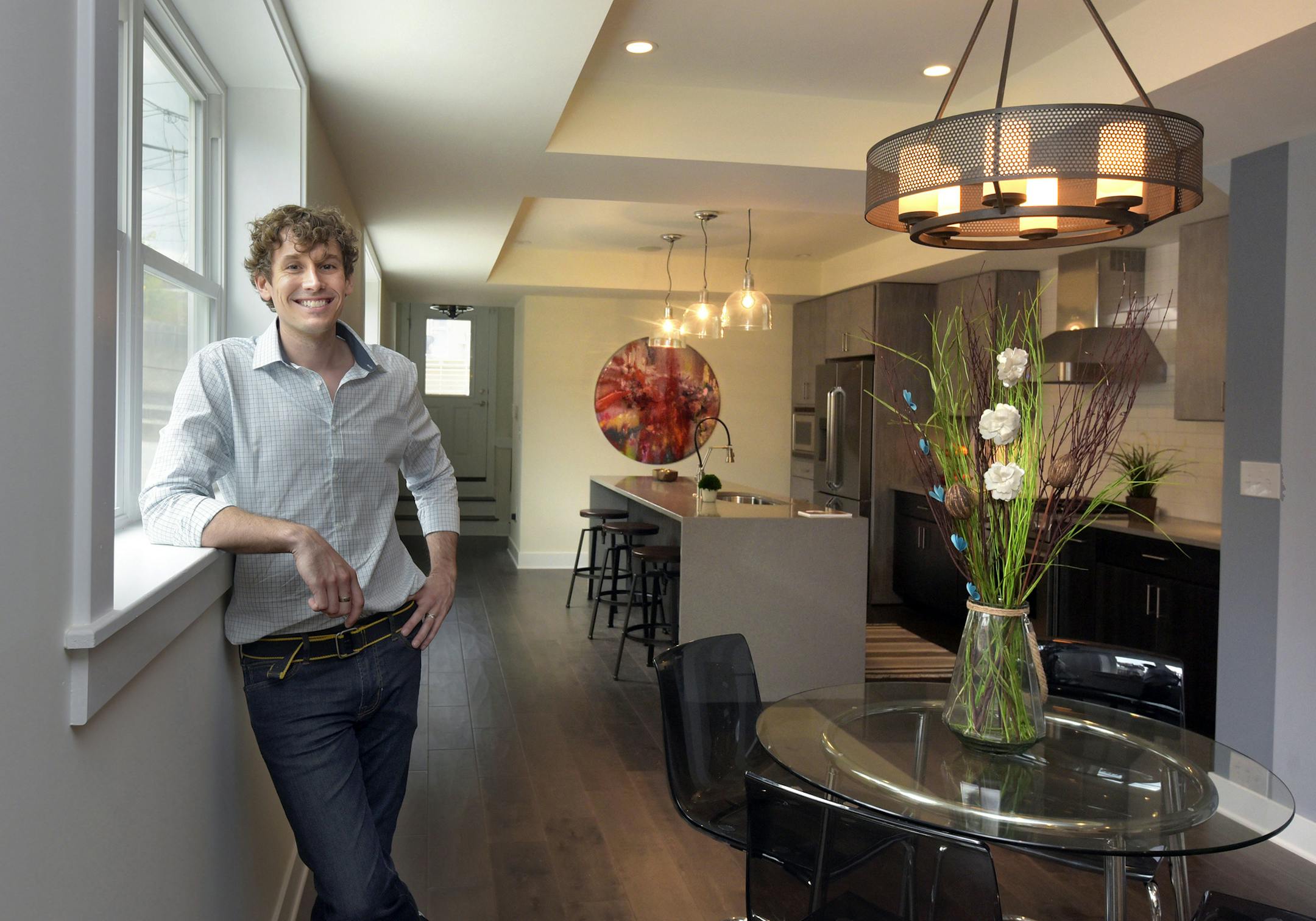 Drew Foxwell used paintings from local artist Kelly L. Walker and other details to add a unique touch to this home he staged. (Algerina Perna/Baltimore Sun/TNS) ORG XMIT: 1187003