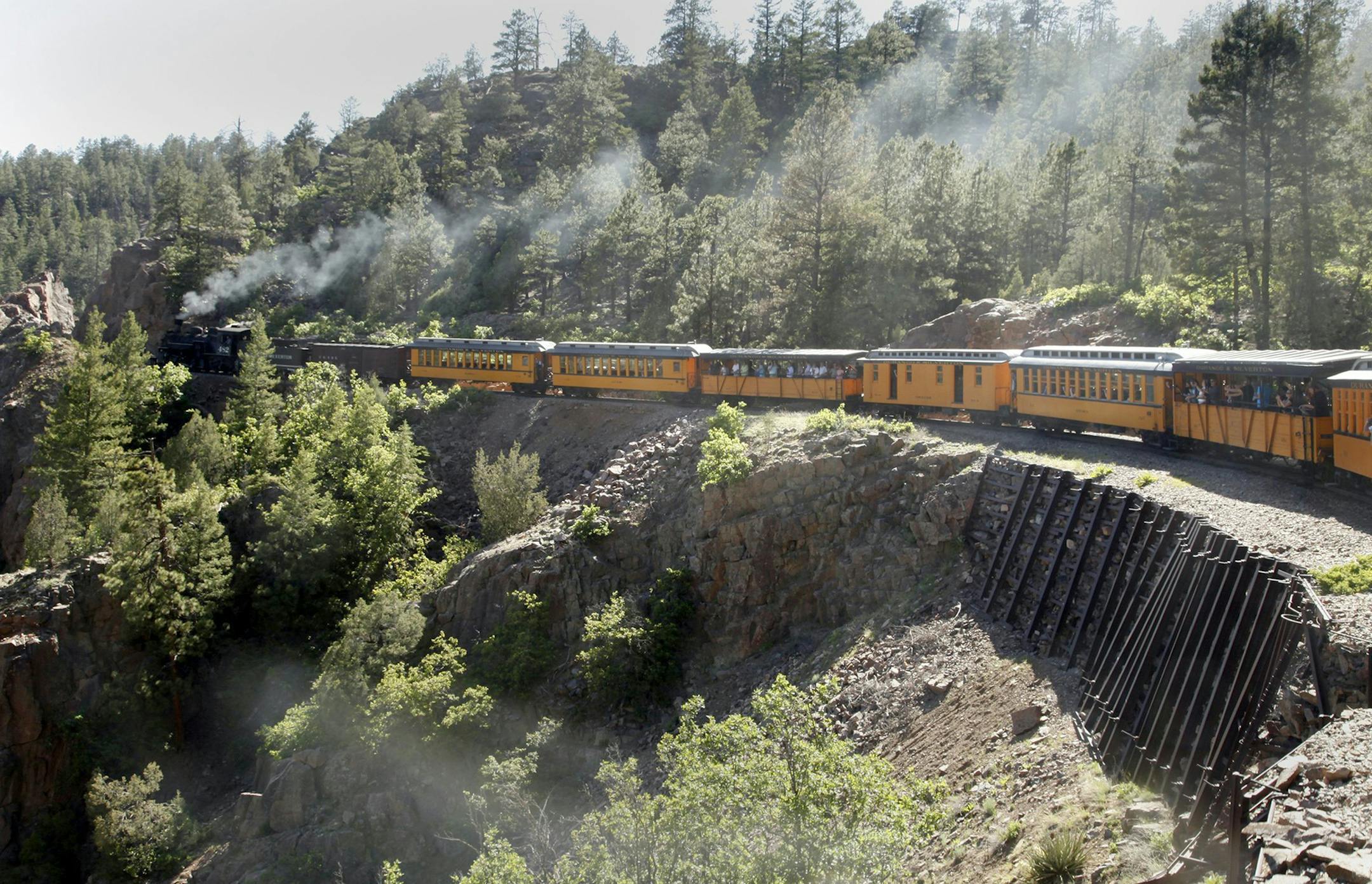 The Durango & Silverton Narrow Gauge Railroad heads down the grade on the Highline above Animas Canyon from Silverton to Durango, Colo., June 5, 2014. (Mark Boster/Los Angeles Times/MCT) ORG XMIT: 1154362