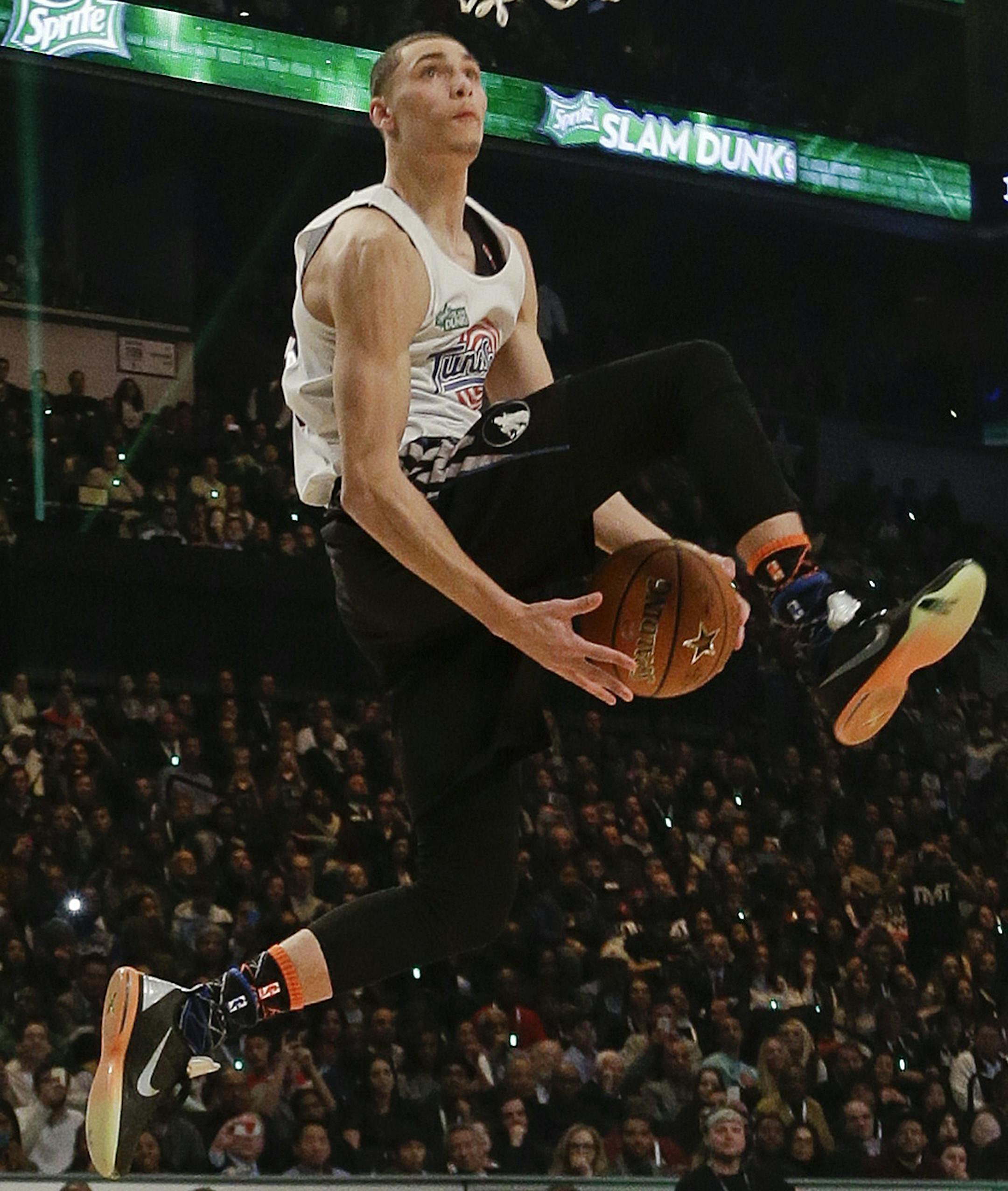 Minnesota Timberwolves' Zach LaVine competes during the NBA All-Star Saturday Slam Dunk basketball contest Saturday, Feb. 14, 2015, in New York. (AP Photo/Frank Franklin II) ORG XMIT: NYFF110