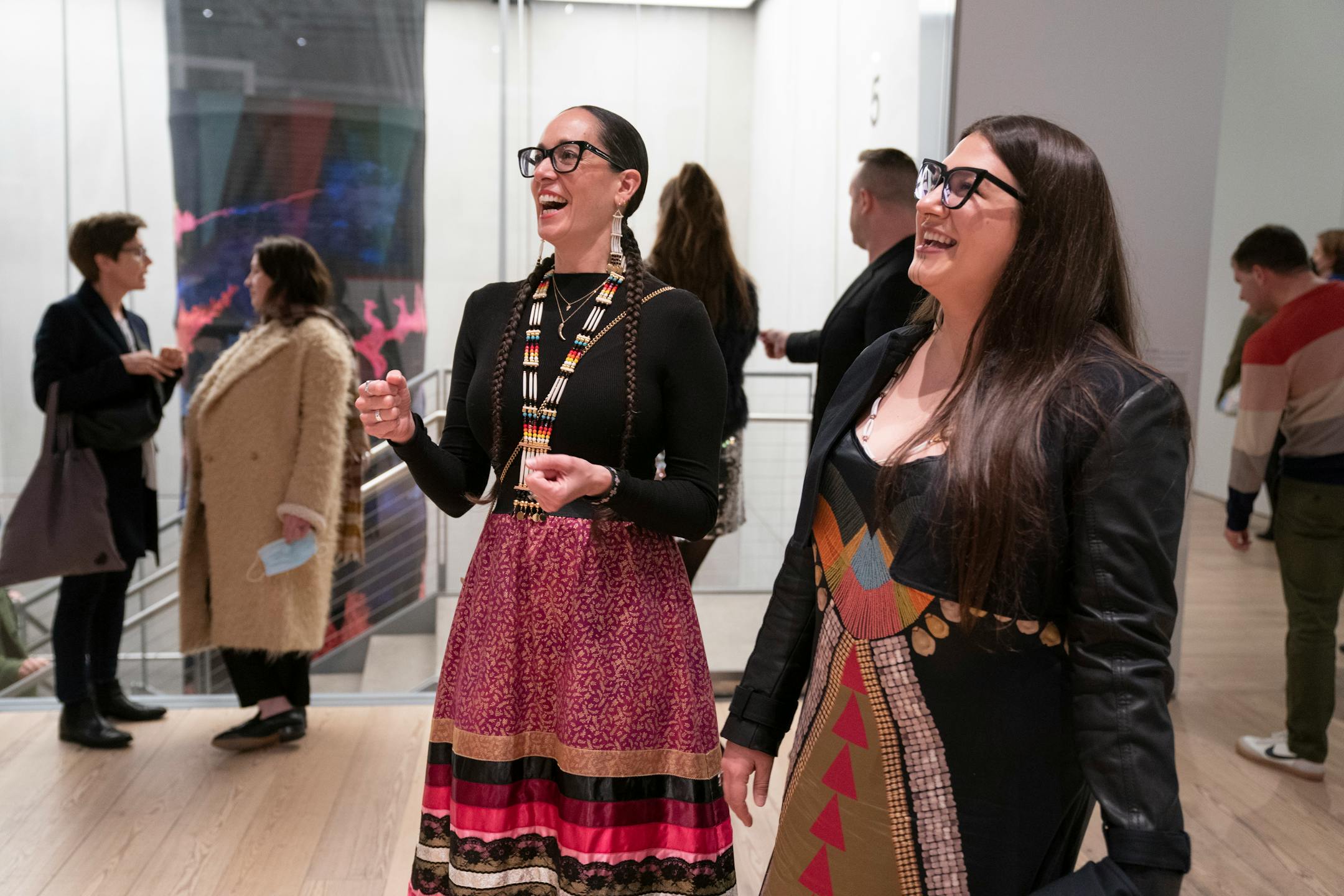 Dyani White Hawk, left, talks with Tania Larsson about her work at the Whitney Museum.
