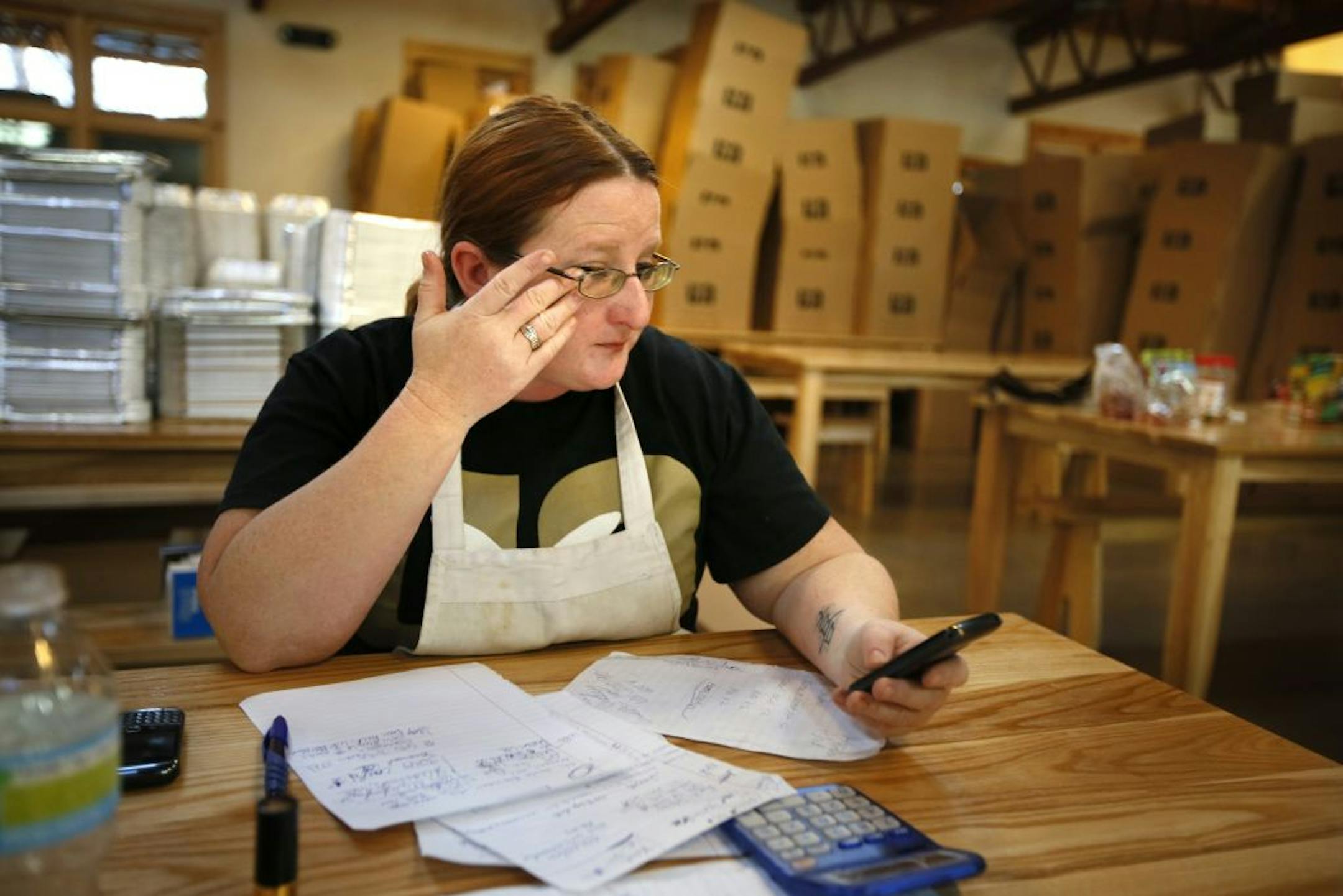 With the cooking started, Tracy Turner took calls from people in need of a meal. She wiped a tear after talking to a mother whose son just died.