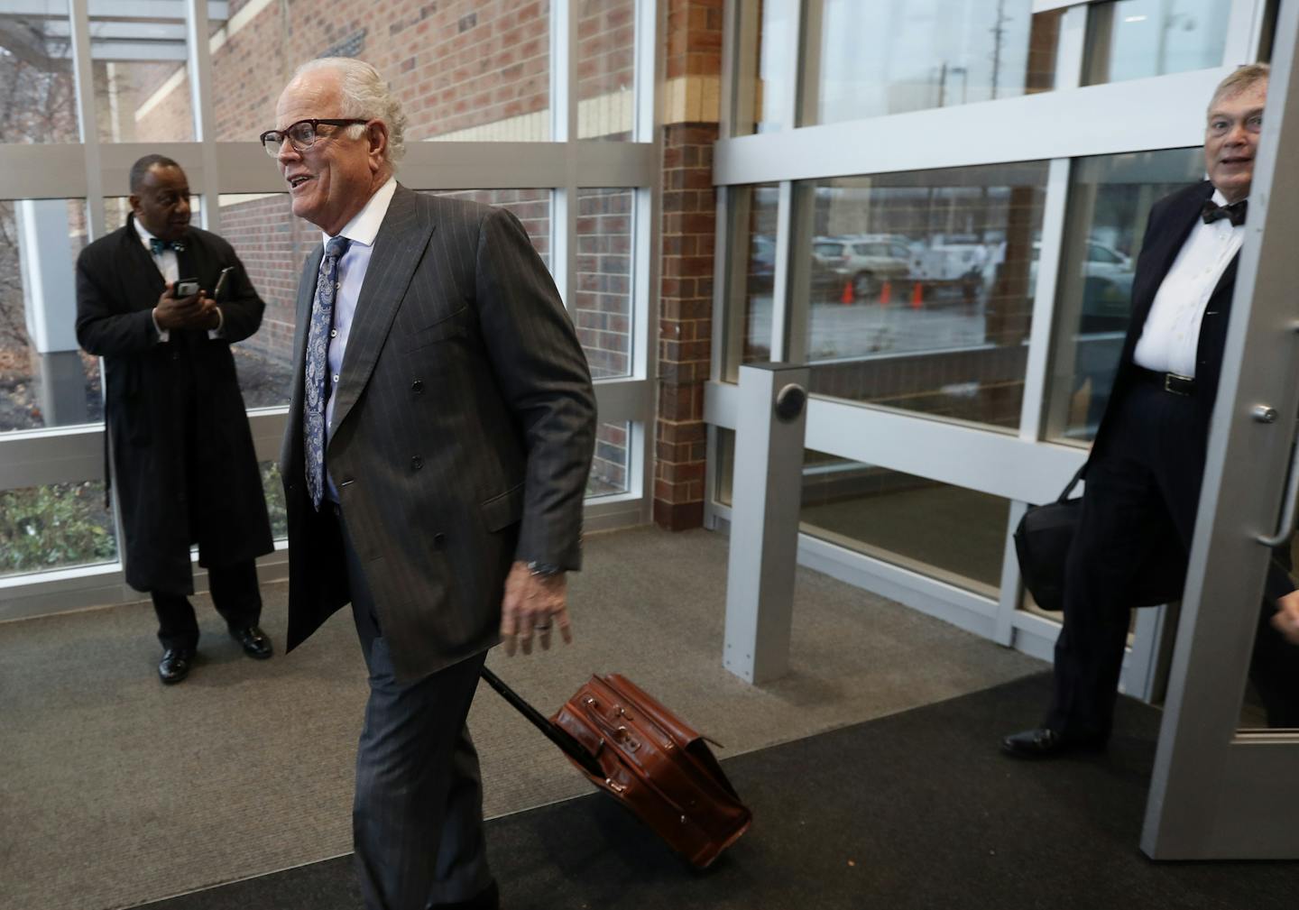 Defense attorney Earl Gray left and Tom Kelly representing Jeronimo Yanez left the Ramsey County district court after officer Yanez made his first court appearance Friday, Nov. 18, 2016 in St. Paul, MN. ] Jerry Holt / jerry. Holt@Startribune.com