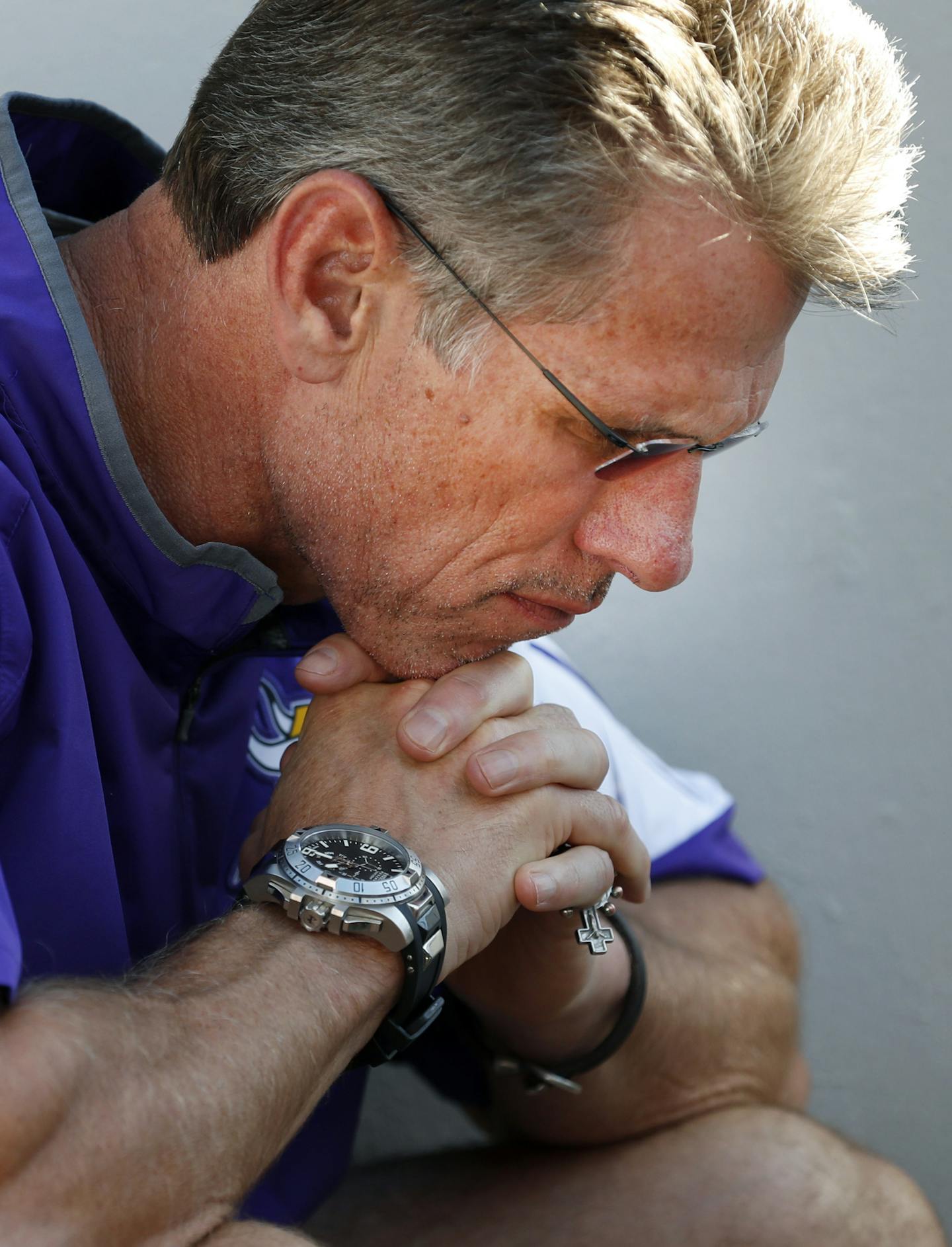 Minnesota Vikings general manager Rick Spielman listens to head coach Mike Zimmer speak during a news conference about the injury to quarterback Teddy Bridgewater, Tuesday, Aug. 30, 2016 in Eden Prairie, Minn. (Carlos Gonzalez/Star Tribune via AP)