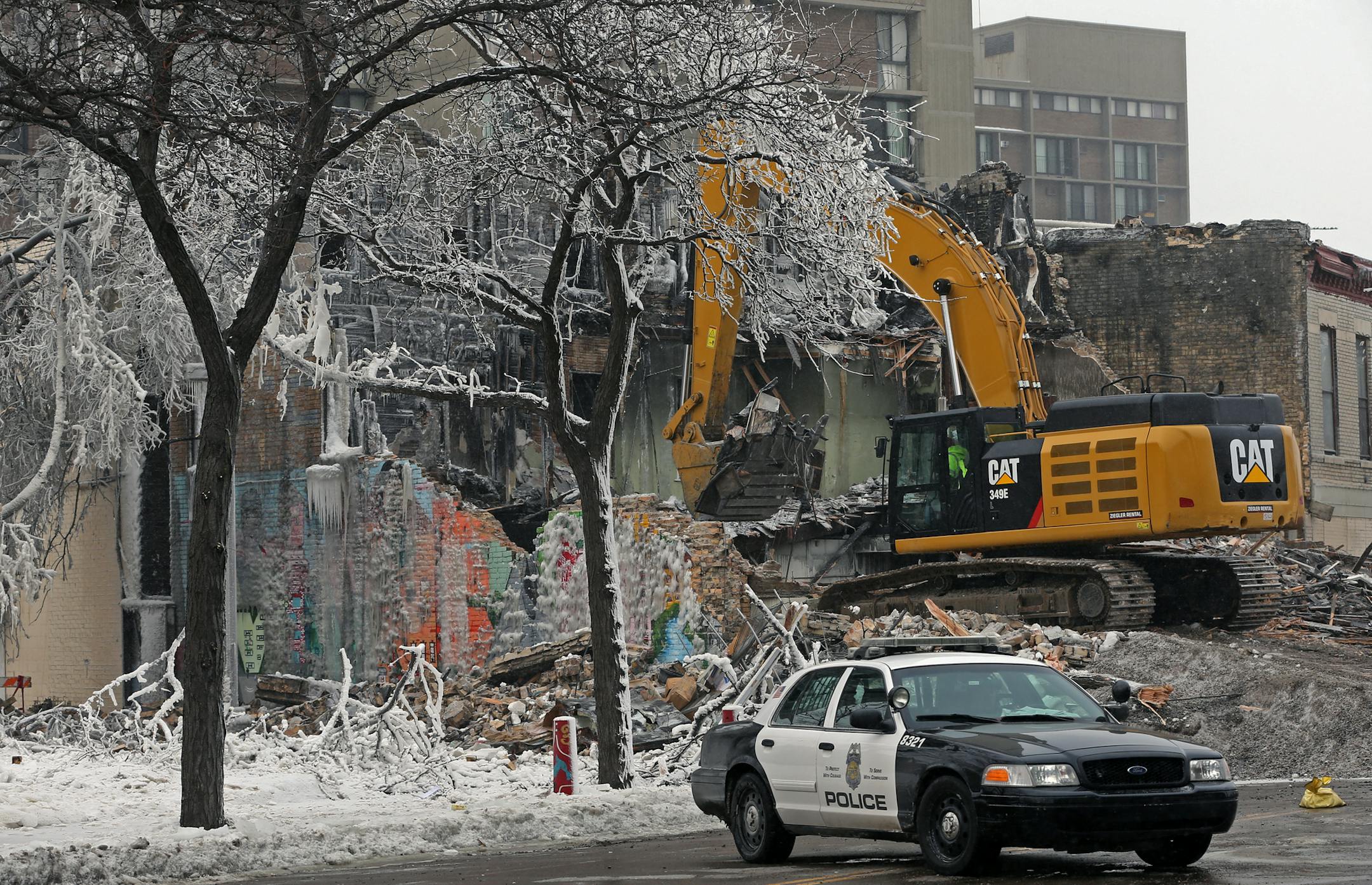 Demolition continued at the site of the apartment fire on Cedar Ave. in Minneapolis on Jan. 3, 2014.