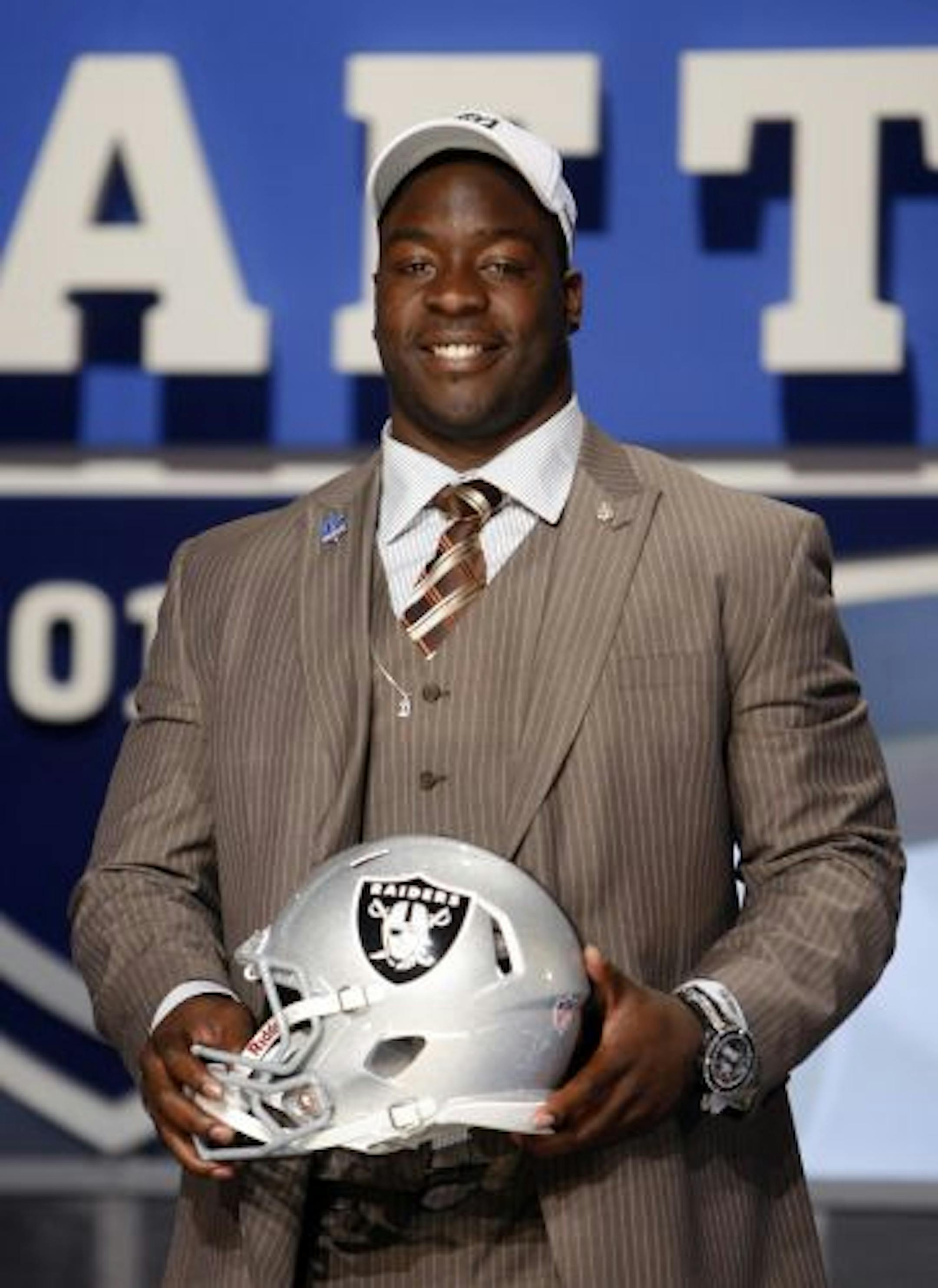 A hit: The Raiders got good value by picking Texas defensive lineman Lamarr Houston in the second round.