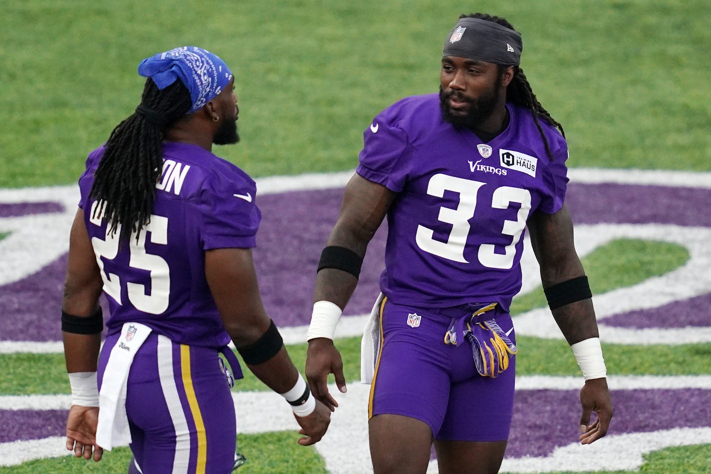 Vikings running backs Alexander Mattison (25) and Dalvin Cook (33) talked during practice Saturday night. ] ANTHONY SOUFFLE • anthony.souffle@startribune.com