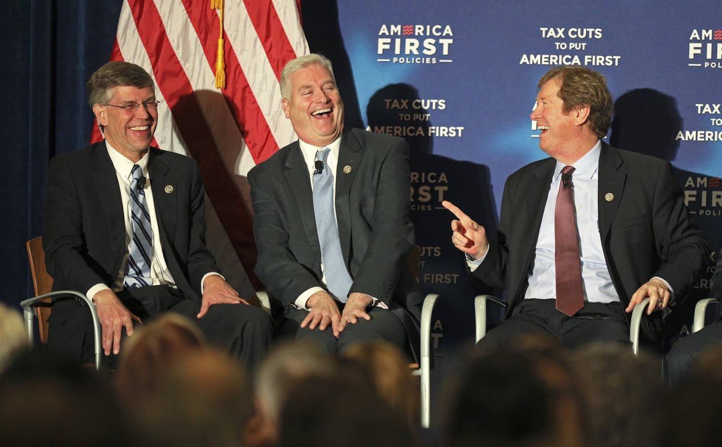 Minnesota Republican U.S. Reps. Erik Paulsen, Tom Emmer and Jason Lewis joked on stage during a panel discussion selling the party's tax cuts and talking up the state of the U.S. economy under President Donald Trump.