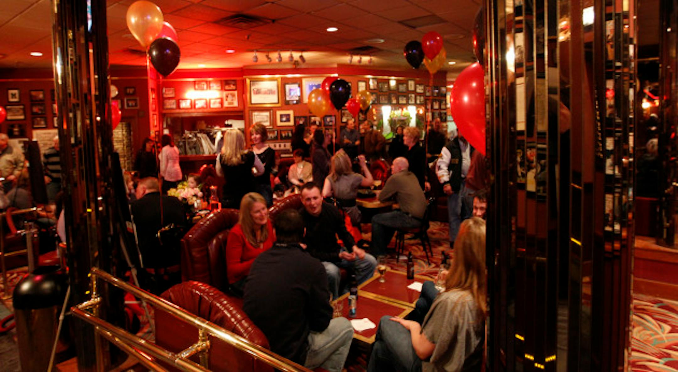 TOM WALLACE '\u20AC' twallace@startribune.com   Assignments #20016749A_ Feb 26, 2011_ SLUG: night0304_ In this installment of "Five Favorite Bars With..." we profile Psycho Suzi's owner Leslie Bock. She'll tell us her 5 favorite bars in the Twin Cities. The specific bar is the old school classic: MANCINI'S (in the lounge). _ IN THIS PHOTO:] Leslie Boch, sippin'\u20ACTM on a '\u20AC\u0153White Russian'\u20AC\uFFFD, a fitting drink for Mancini'\u20ACTMs bar art deco charm. The view from leslie's chair of the lounge/dining area.