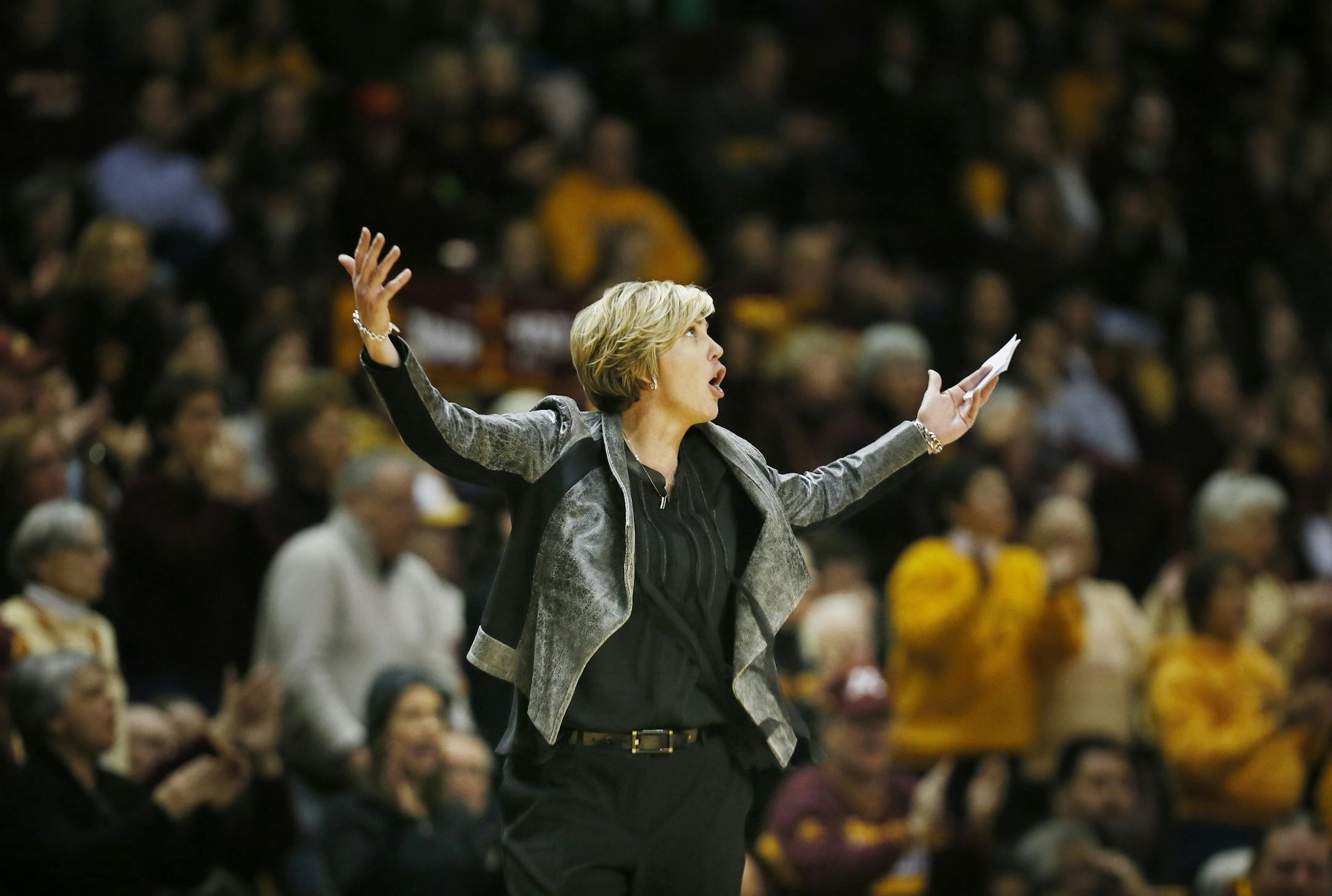 Minnesota head coach Marlene Stollings waved for the fans to get loud Sunday at Williams arena January 11, 2015 Minneapolis, MN. Maryland beat Minnesota 77-73 in Big Ten action Sunday at Williams Arena.